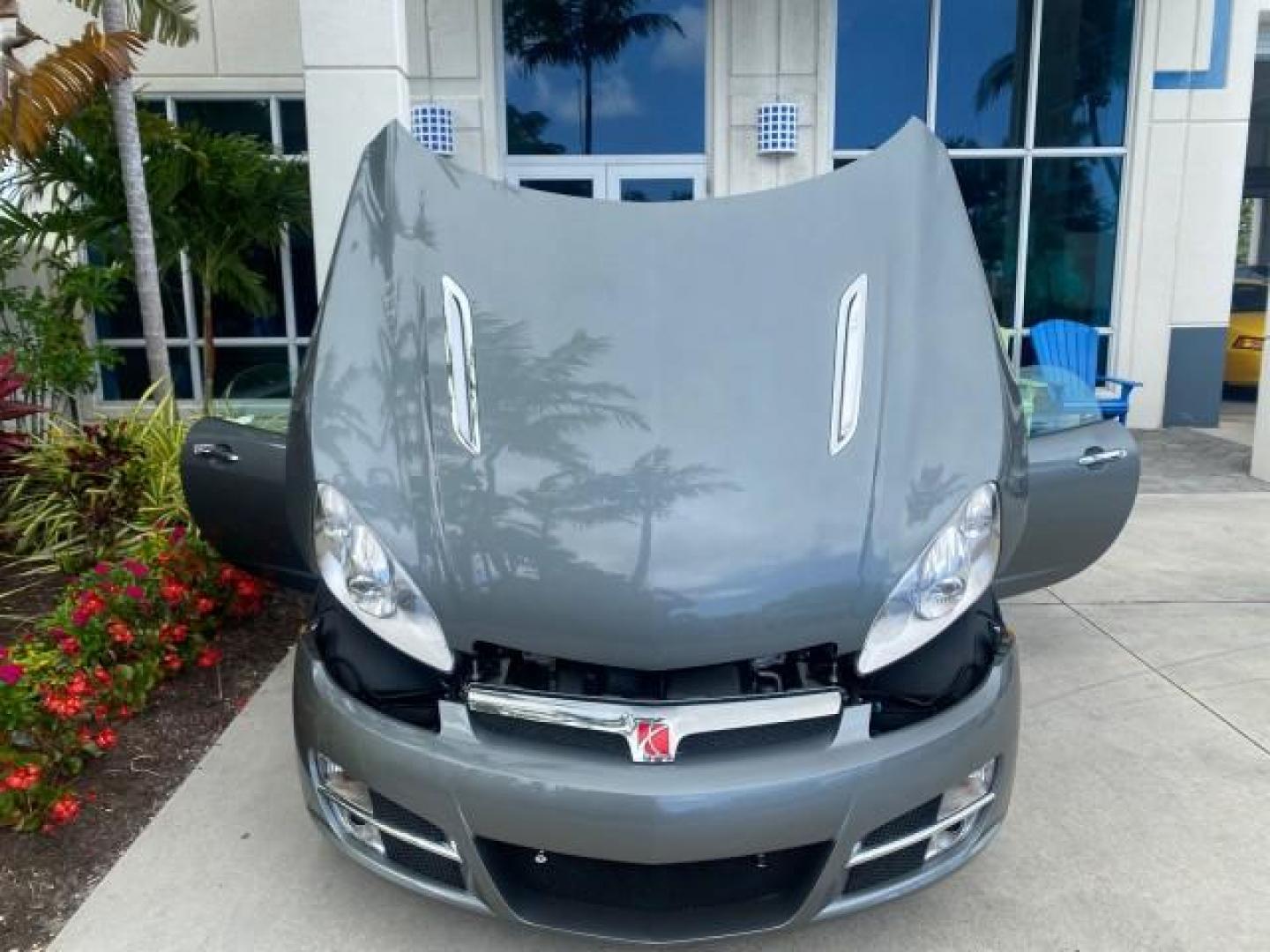 2007 Silver Graphite /Black Saturn Sky CONV LOW MILES 42,288 1 OWNER (1G8MB35B47Y) with an 2.4L DOHC VVT I4 Aluminum Ecotec Engine engine, Automatic transmission, located at 4701 North Dixie Hwy, Pompano Beach, FL, 33064, (954) 422-2889, 26.240938, -80.123474 - OUR WEBPAGE FLORIDACARS1.COM HAS OVER 100 PHOTOS AND FREE CARFAX LINK 2007 Saturn SKY 1 OWNER Convertible 2.4L I4 F DOHC Gasoline 28 MPG Rear Wheel Drive Features ABS Brakes Air Conditioning Alloy Wheels AM/FM Stereo Automatic Transmission Auxiliary Audio Input CD Audio Cruise Control Leather Seats - Photo#17