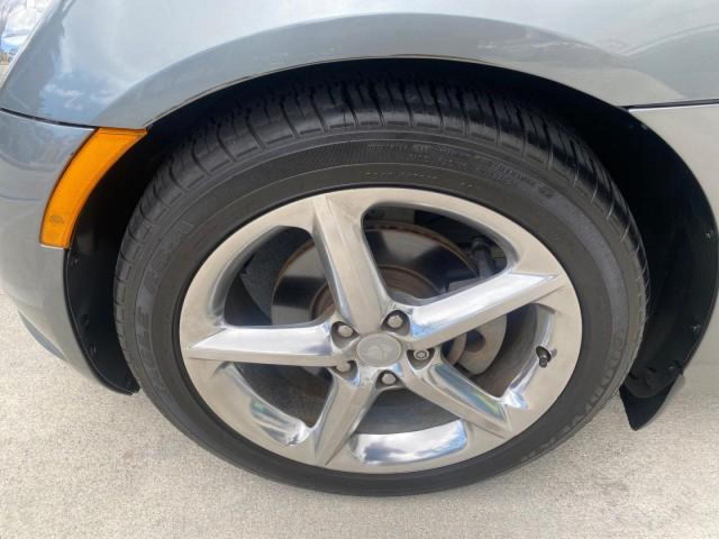 2007 Silver Graphite /Black Saturn Sky CONV LOW MILES 42,288 1 OWNER (1G8MB35B47Y) with an 2.4L DOHC VVT I4 Aluminum Ecotec Engine engine, Automatic transmission, located at 4701 North Dixie Hwy, Pompano Beach, FL, 33064, (954) 422-2889, 26.240938, -80.123474 - OUR WEBPAGE FLORIDACARS1.COM HAS OVER 100 PHOTOS AND FREE CARFAX LINK 2007 Saturn SKY 1 OWNER Convertible 2.4L I4 F DOHC Gasoline 28 MPG Rear Wheel Drive Features ABS Brakes Air Conditioning Alloy Wheels AM/FM Stereo Automatic Transmission Auxiliary Audio Input CD Audio Cruise Control Leather Seats - Photo#19
