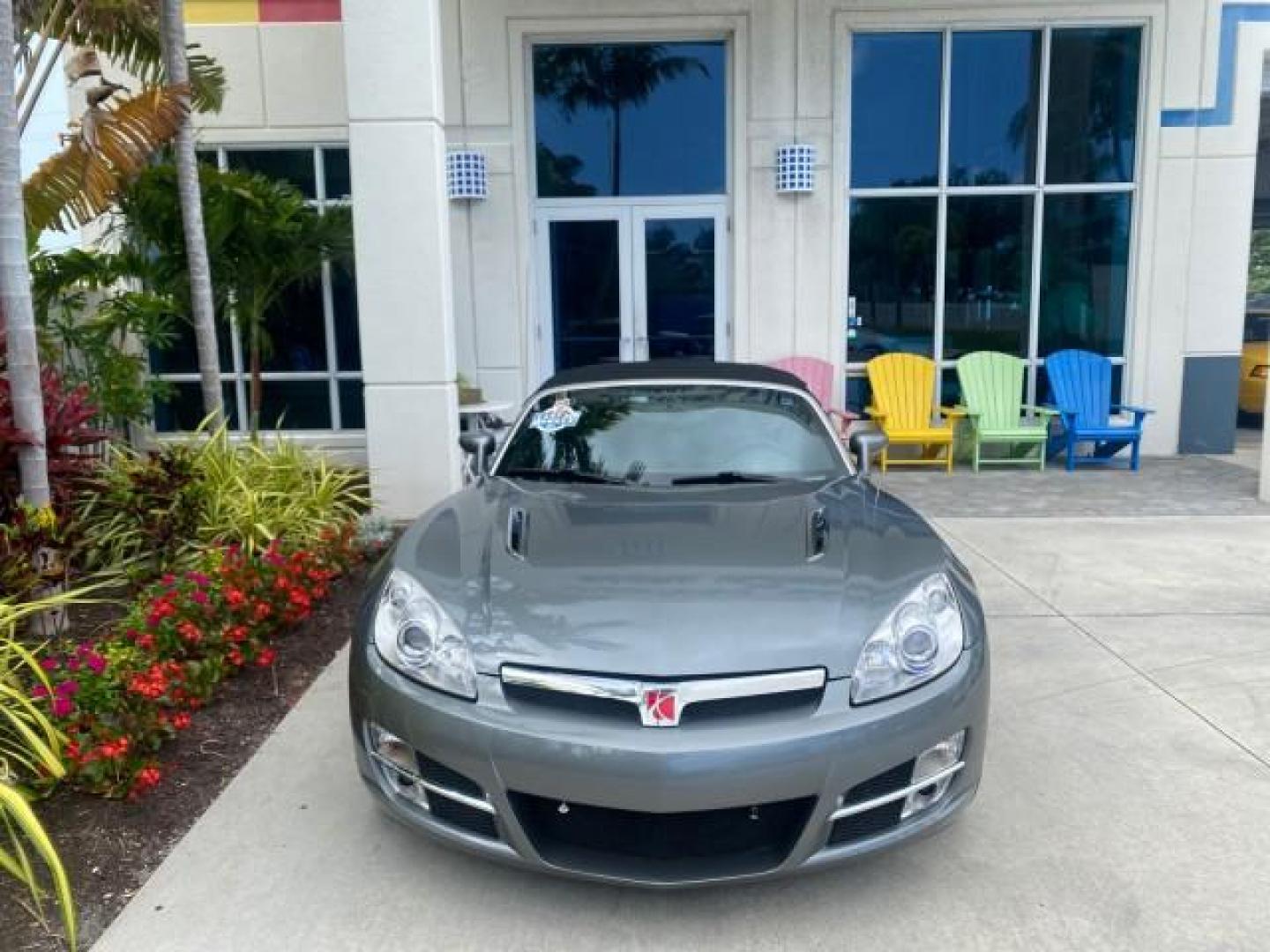 2007 Silver Graphite /Black Saturn Sky CONV LOW MILES 42,288 1 OWNER (1G8MB35B47Y) with an 2.4L DOHC VVT I4 Aluminum Ecotec Engine engine, Automatic transmission, located at 4701 North Dixie Hwy, Pompano Beach, FL, 33064, (954) 422-2889, 26.240938, -80.123474 - OUR WEBPAGE FLORIDACARS1.COM HAS OVER 100 PHOTOS AND FREE CARFAX LINK 2007 Saturn SKY 1 OWNER Convertible 2.4L I4 F DOHC Gasoline 28 MPG Rear Wheel Drive Features ABS Brakes Air Conditioning Alloy Wheels AM/FM Stereo Automatic Transmission Auxiliary Audio Input CD Audio Cruise Control Leather Seats - Photo#26
