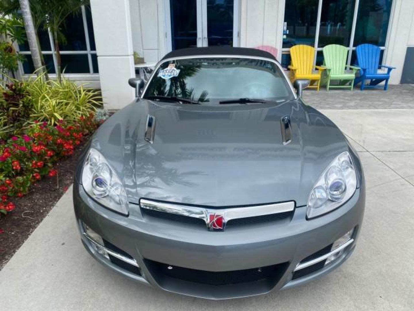 2007 Silver Graphite /Black Saturn Sky CONV LOW MILES 42,288 1 OWNER (1G8MB35B47Y) with an 2.4L DOHC VVT I4 Aluminum Ecotec Engine engine, Automatic transmission, located at 4701 North Dixie Hwy, Pompano Beach, FL, 33064, (954) 422-2889, 26.240938, -80.123474 - OUR WEBPAGE FLORIDACARS1.COM HAS OVER 100 PHOTOS AND FREE CARFAX LINK 2007 Saturn SKY 1 OWNER Convertible 2.4L I4 F DOHC Gasoline 28 MPG Rear Wheel Drive Features ABS Brakes Air Conditioning Alloy Wheels AM/FM Stereo Automatic Transmission Auxiliary Audio Input CD Audio Cruise Control Leather Seats - Photo#27