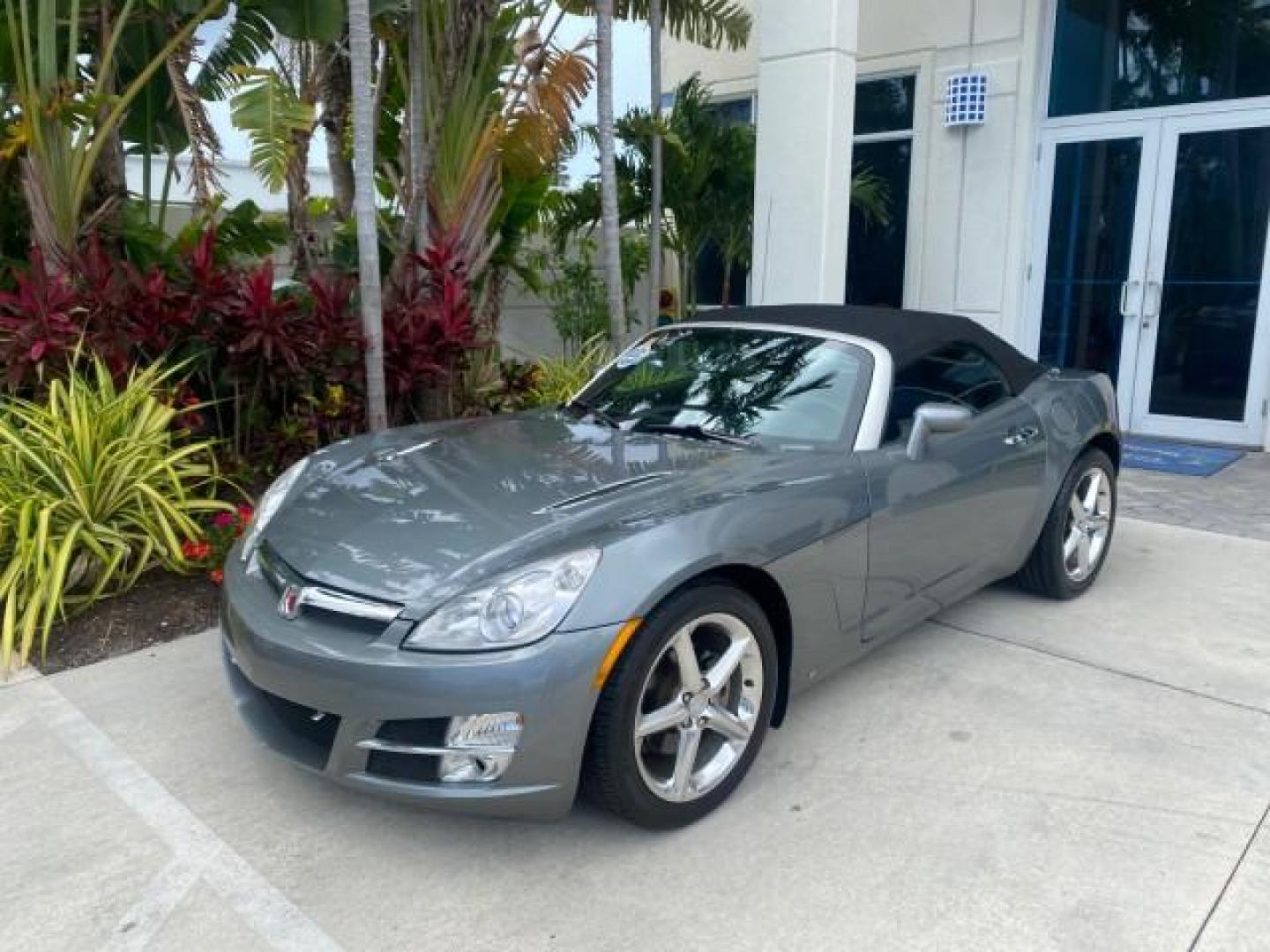 2007 Silver Graphite /Black Saturn Sky CONV LOW MILES 42,288 1 OWNER (1G8MB35B47Y) with an 2.4L DOHC VVT I4 Aluminum Ecotec Engine engine, Automatic transmission, located at 4701 North Dixie Hwy, Pompano Beach, FL, 33064, (954) 422-2889, 26.240938, -80.123474 - OUR WEBPAGE FLORIDACARS1.COM HAS OVER 100 PHOTOS AND FREE CARFAX LINK 2007 Saturn SKY 1 OWNER Convertible 2.4L I4 F DOHC Gasoline 28 MPG Rear Wheel Drive Features ABS Brakes Air Conditioning Alloy Wheels AM/FM Stereo Automatic Transmission Auxiliary Audio Input CD Audio Cruise Control Leather Seats - Photo#28