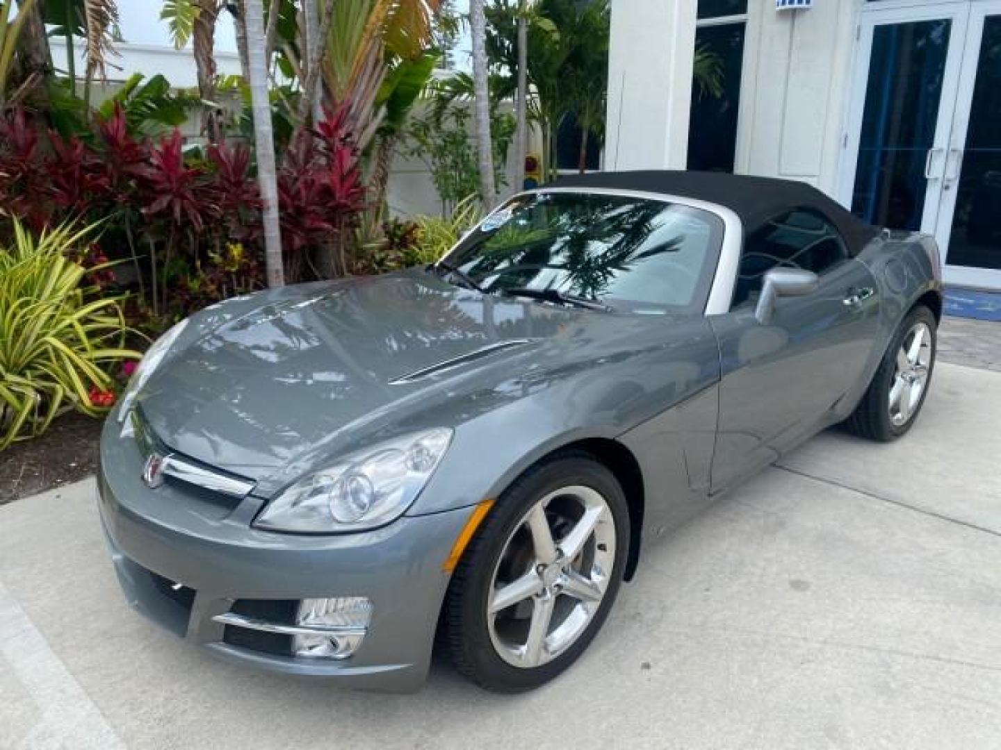 2007 Silver Graphite /Black Saturn Sky CONV LOW MILES 42,288 1 OWNER (1G8MB35B47Y) with an 2.4L DOHC VVT I4 Aluminum Ecotec Engine engine, Automatic transmission, located at 4701 North Dixie Hwy, Pompano Beach, FL, 33064, (954) 422-2889, 26.240938, -80.123474 - OUR WEBPAGE FLORIDACARS1.COM HAS OVER 100 PHOTOS AND FREE CARFAX LINK 2007 Saturn SKY 1 OWNER Convertible 2.4L I4 F DOHC Gasoline 28 MPG Rear Wheel Drive Features ABS Brakes Air Conditioning Alloy Wheels AM/FM Stereo Automatic Transmission Auxiliary Audio Input CD Audio Cruise Control Leather Seats - Photo#29