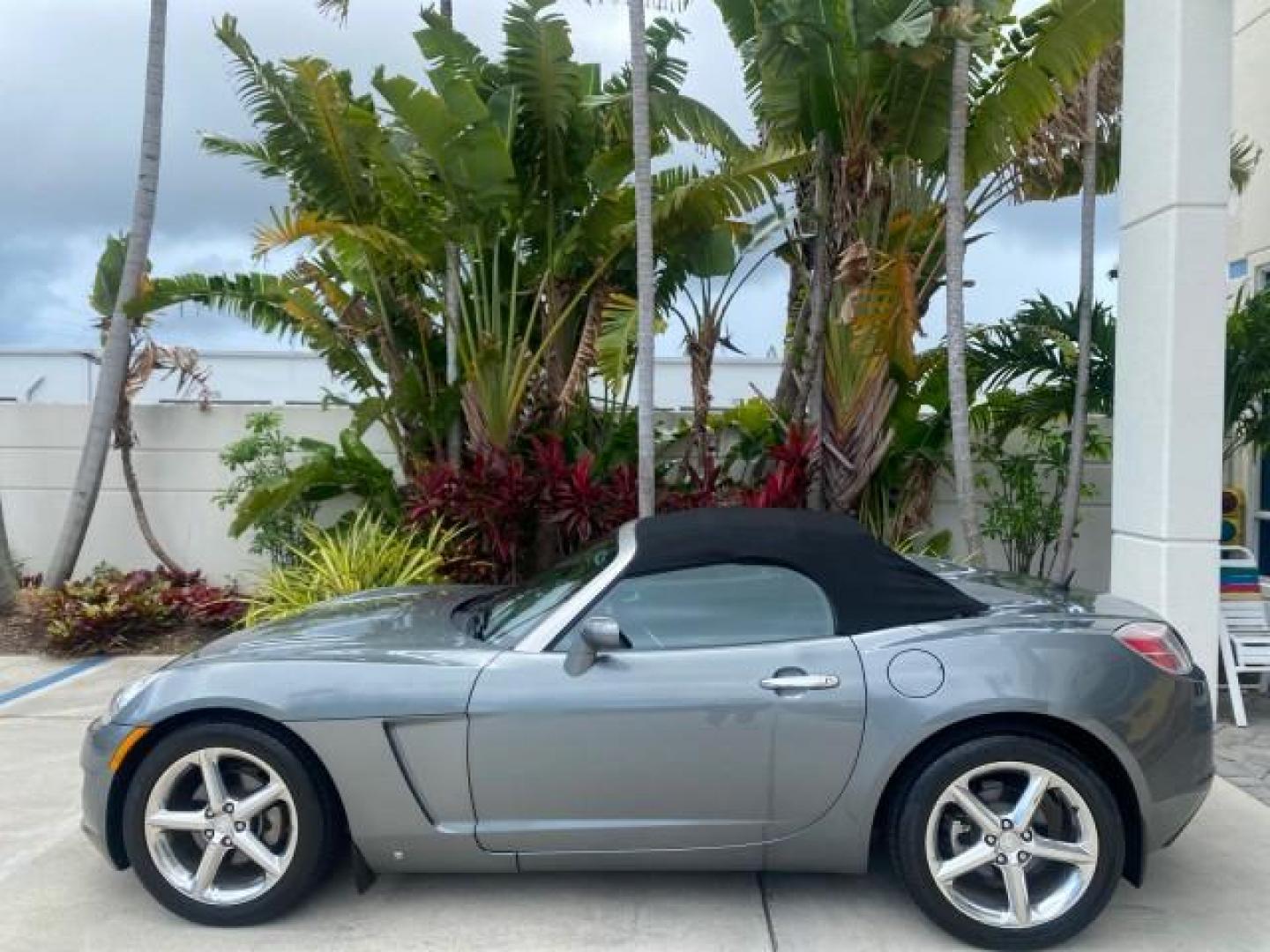 2007 Silver Graphite /Black Saturn Sky CONV LOW MILES 42,288 1 OWNER (1G8MB35B47Y) with an 2.4L DOHC VVT I4 Aluminum Ecotec Engine engine, Automatic transmission, located at 4701 North Dixie Hwy, Pompano Beach, FL, 33064, (954) 422-2889, 26.240938, -80.123474 - OUR WEBPAGE FLORIDACARS1.COM HAS OVER 100 PHOTOS AND FREE CARFAX LINK 2007 Saturn SKY 1 OWNER Convertible 2.4L I4 F DOHC Gasoline 28 MPG Rear Wheel Drive Features ABS Brakes Air Conditioning Alloy Wheels AM/FM Stereo Automatic Transmission Auxiliary Audio Input CD Audio Cruise Control Leather Seats - Photo#31