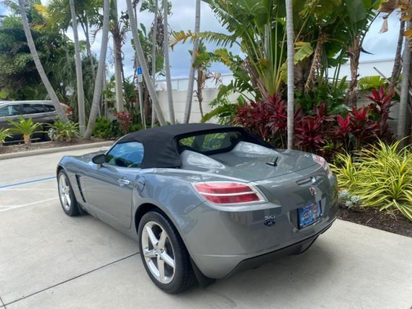 2007 Silver Graphite /Black Saturn Sky CONV LOW MILES 42,288 1 OWNER (1G8MB35B47Y) with an 2.4L DOHC VVT I4 Aluminum Ecotec Engine engine, Automatic transmission, located at 4701 North Dixie Hwy, Pompano Beach, FL, 33064, (954) 422-2889, 26.240938, -80.123474 - OUR WEBPAGE FLORIDACARS1.COM HAS OVER 100 PHOTOS AND FREE CARFAX LINK 2007 Saturn SKY 1 OWNER Convertible 2.4L I4 F DOHC Gasoline 28 MPG Rear Wheel Drive Features ABS Brakes Air Conditioning Alloy Wheels AM/FM Stereo Automatic Transmission Auxiliary Audio Input CD Audio Cruise Control Leather Seats - Photo#32