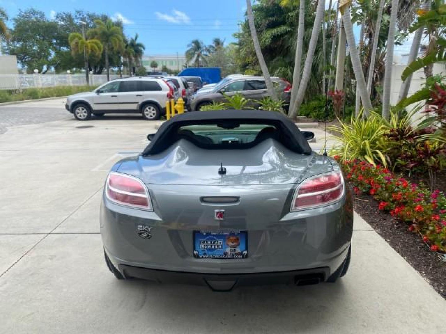2007 Silver Graphite /Black Saturn Sky CONV LOW MILES 42,288 1 OWNER (1G8MB35B47Y) with an 2.4L DOHC VVT I4 Aluminum Ecotec Engine engine, Automatic transmission, located at 4701 North Dixie Hwy, Pompano Beach, FL, 33064, (954) 422-2889, 26.240938, -80.123474 - OUR WEBPAGE FLORIDACARS1.COM HAS OVER 100 PHOTOS AND FREE CARFAX LINK 2007 Saturn SKY 1 OWNER Convertible 2.4L I4 F DOHC Gasoline 28 MPG Rear Wheel Drive Features ABS Brakes Air Conditioning Alloy Wheels AM/FM Stereo Automatic Transmission Auxiliary Audio Input CD Audio Cruise Control Leather Seats - Photo#34