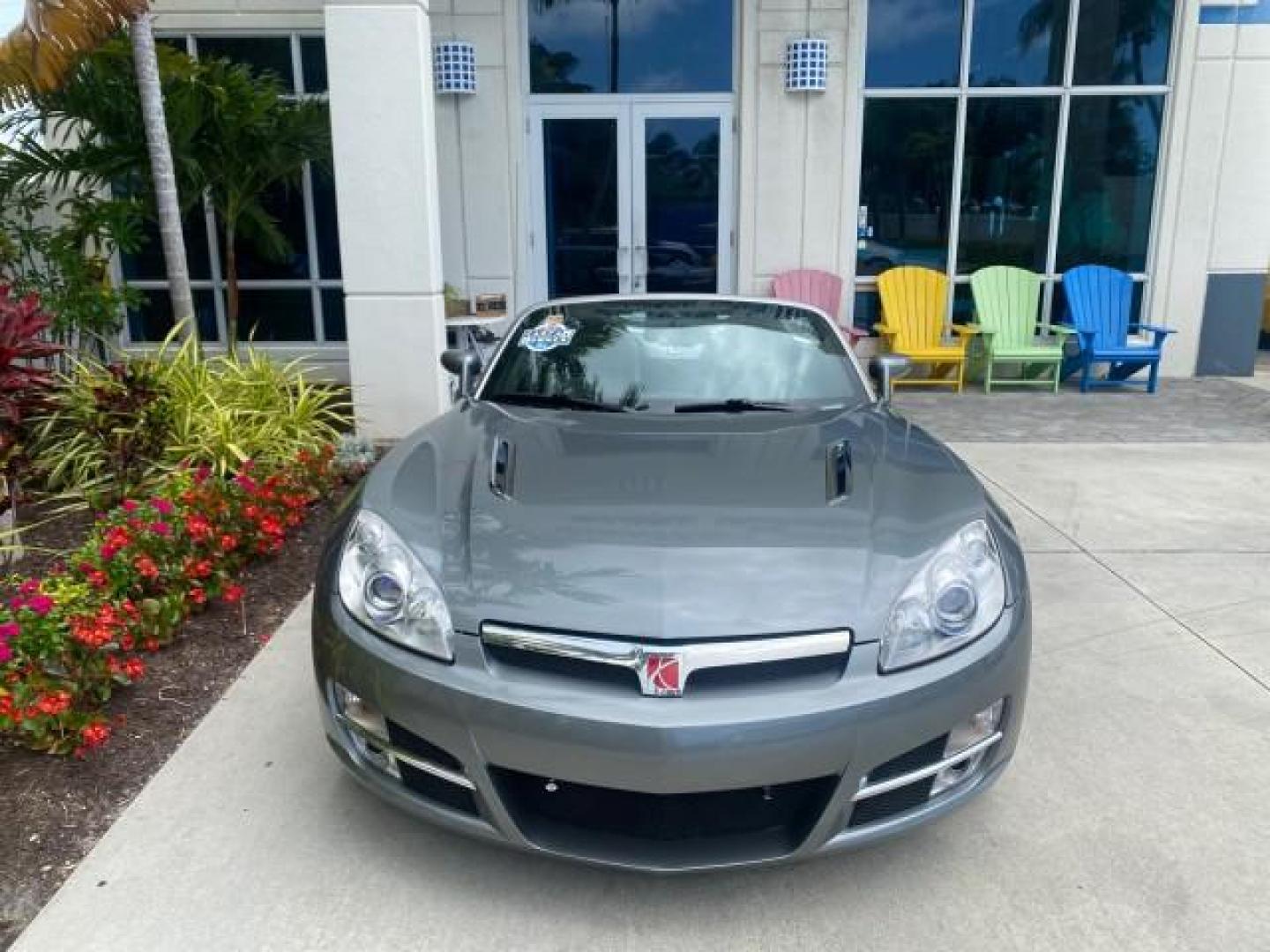 2007 Silver Graphite /Black Saturn Sky CONV LOW MILES 42,288 1 OWNER (1G8MB35B47Y) with an 2.4L DOHC VVT I4 Aluminum Ecotec Engine engine, Automatic transmission, located at 4701 North Dixie Hwy, Pompano Beach, FL, 33064, (954) 422-2889, 26.240938, -80.123474 - OUR WEBPAGE FLORIDACARS1.COM HAS OVER 100 PHOTOS AND FREE CARFAX LINK 2007 Saturn SKY 1 OWNER Convertible 2.4L I4 F DOHC Gasoline 28 MPG Rear Wheel Drive Features ABS Brakes Air Conditioning Alloy Wheels AM/FM Stereo Automatic Transmission Auxiliary Audio Input CD Audio Cruise Control Leather Seats - Photo#36