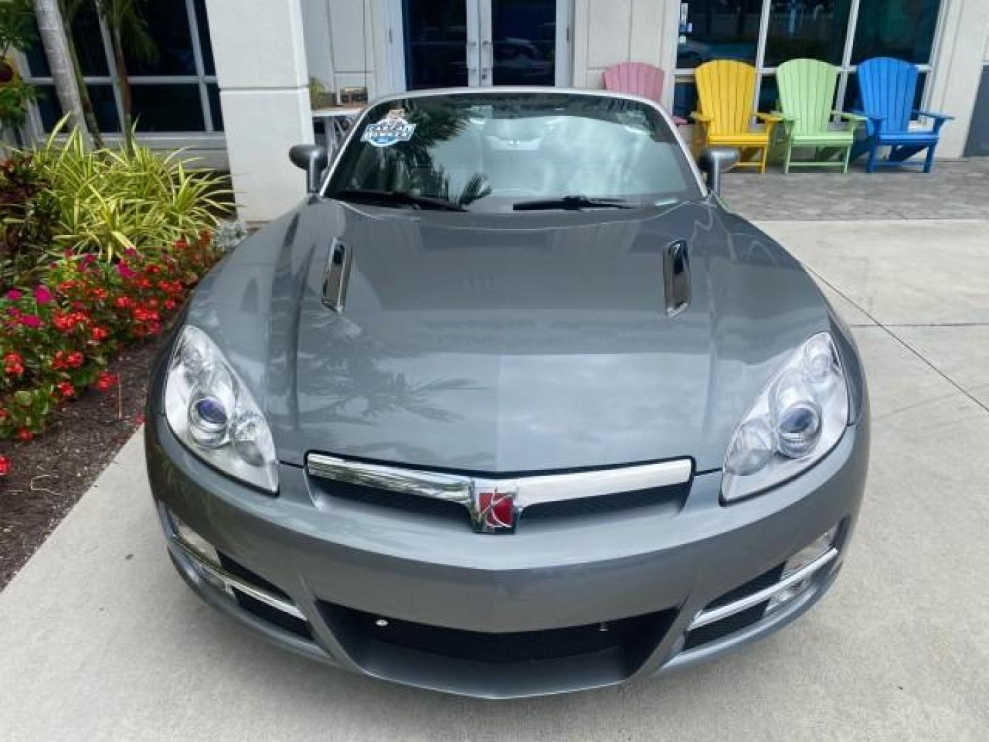 2007 Silver Graphite /Black Saturn Sky CONV LOW MILES 42,288 1 OWNER (1G8MB35B47Y) with an 2.4L DOHC VVT I4 Aluminum Ecotec Engine engine, Automatic transmission, located at 4701 North Dixie Hwy, Pompano Beach, FL, 33064, (954) 422-2889, 26.240938, -80.123474 - OUR WEBPAGE FLORIDACARS1.COM HAS OVER 100 PHOTOS AND FREE CARFAX LINK 2007 Saturn SKY 1 OWNER Convertible 2.4L I4 F DOHC Gasoline 28 MPG Rear Wheel Drive Features ABS Brakes Air Conditioning Alloy Wheels AM/FM Stereo Automatic Transmission Auxiliary Audio Input CD Audio Cruise Control Leather Seats - Photo#37