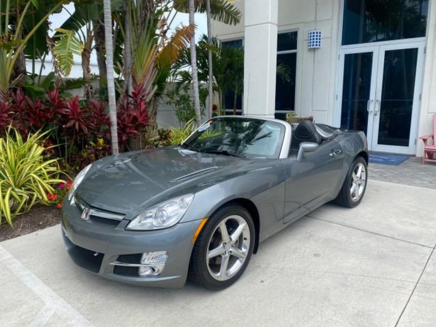 2007 Silver Graphite /Black Saturn Sky CONV LOW MILES 42,288 1 OWNER (1G8MB35B47Y) with an 2.4L DOHC VVT I4 Aluminum Ecotec Engine engine, Automatic transmission, located at 4701 North Dixie Hwy, Pompano Beach, FL, 33064, (954) 422-2889, 26.240938, -80.123474 - OUR WEBPAGE FLORIDACARS1.COM HAS OVER 100 PHOTOS AND FREE CARFAX LINK 2007 Saturn SKY 1 OWNER Convertible 2.4L I4 F DOHC Gasoline 28 MPG Rear Wheel Drive Features ABS Brakes Air Conditioning Alloy Wheels AM/FM Stereo Automatic Transmission Auxiliary Audio Input CD Audio Cruise Control Leather Seats - Photo#38