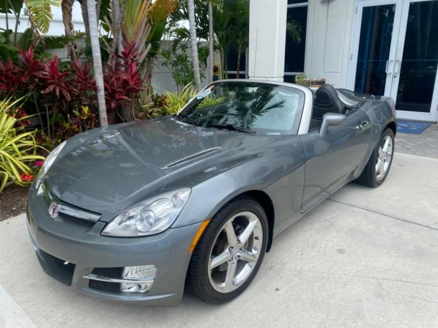 2007 Silver Graphite /Black Saturn Sky CONV LOW MILES 42,288 1 OWNER (1G8MB35B47Y) with an 2.4L DOHC VVT I4 Aluminum Ecotec Engine engine, Automatic transmission, located at 4701 North Dixie Hwy, Pompano Beach, FL, 33064, (954) 422-2889, 26.240938, -80.123474 - OUR WEBPAGE FLORIDACARS1.COM HAS OVER 100 PHOTOS AND FREE CARFAX LINK 2007 Saturn SKY 1 OWNER Convertible 2.4L I4 F DOHC Gasoline 28 MPG Rear Wheel Drive Features ABS Brakes Air Conditioning Alloy Wheels AM/FM Stereo Automatic Transmission Auxiliary Audio Input CD Audio Cruise Control Leather Seats - Photo#39