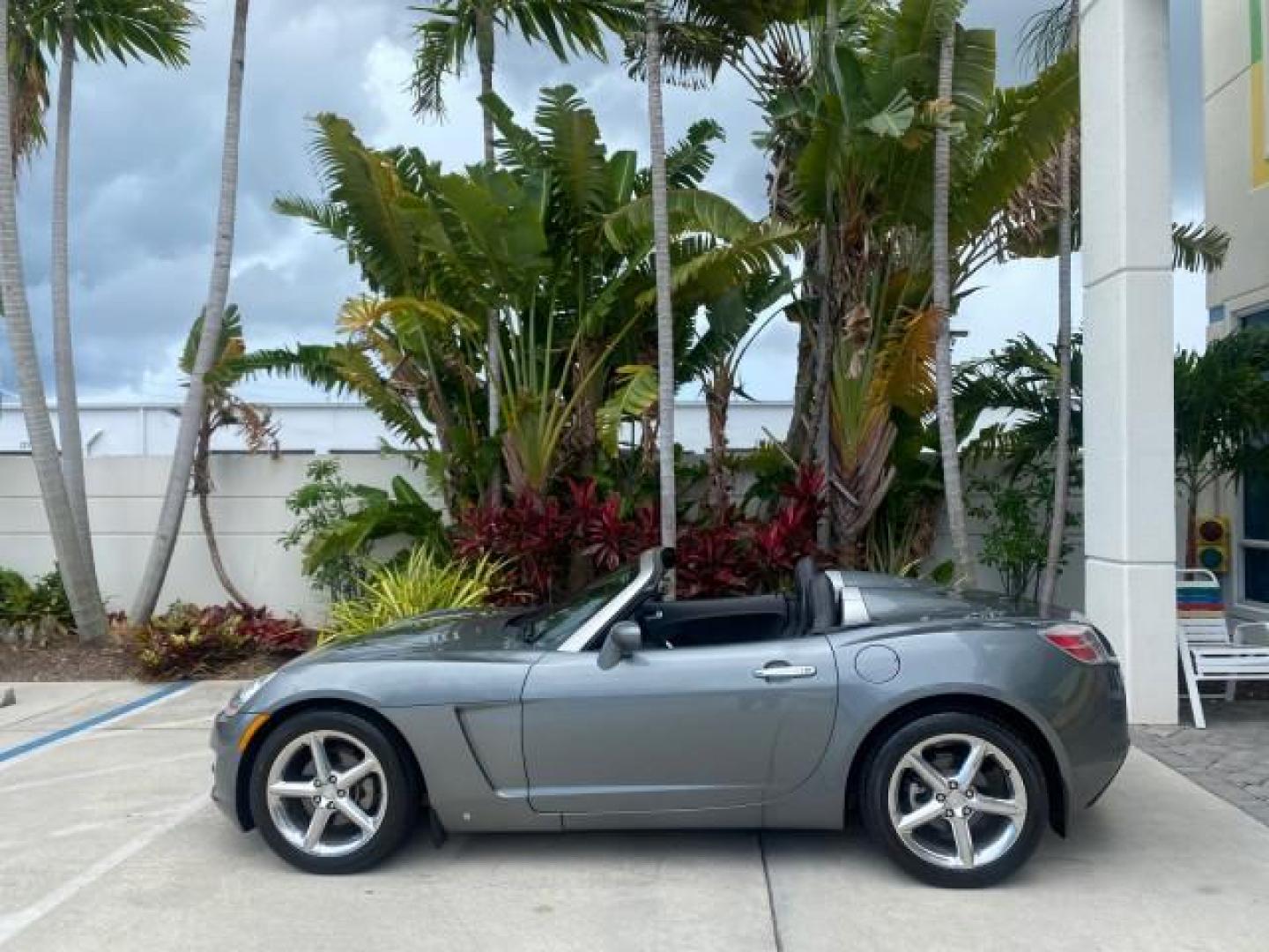 2007 Silver Graphite /Black Saturn Sky CONV LOW MILES 42,288 1 OWNER (1G8MB35B47Y) with an 2.4L DOHC VVT I4 Aluminum Ecotec Engine engine, Automatic transmission, located at 4701 North Dixie Hwy, Pompano Beach, FL, 33064, (954) 422-2889, 26.240938, -80.123474 - OUR WEBPAGE FLORIDACARS1.COM HAS OVER 100 PHOTOS AND FREE CARFAX LINK 2007 Saturn SKY 1 OWNER Convertible 2.4L I4 F DOHC Gasoline 28 MPG Rear Wheel Drive Features ABS Brakes Air Conditioning Alloy Wheels AM/FM Stereo Automatic Transmission Auxiliary Audio Input CD Audio Cruise Control Leather Seats - Photo#40