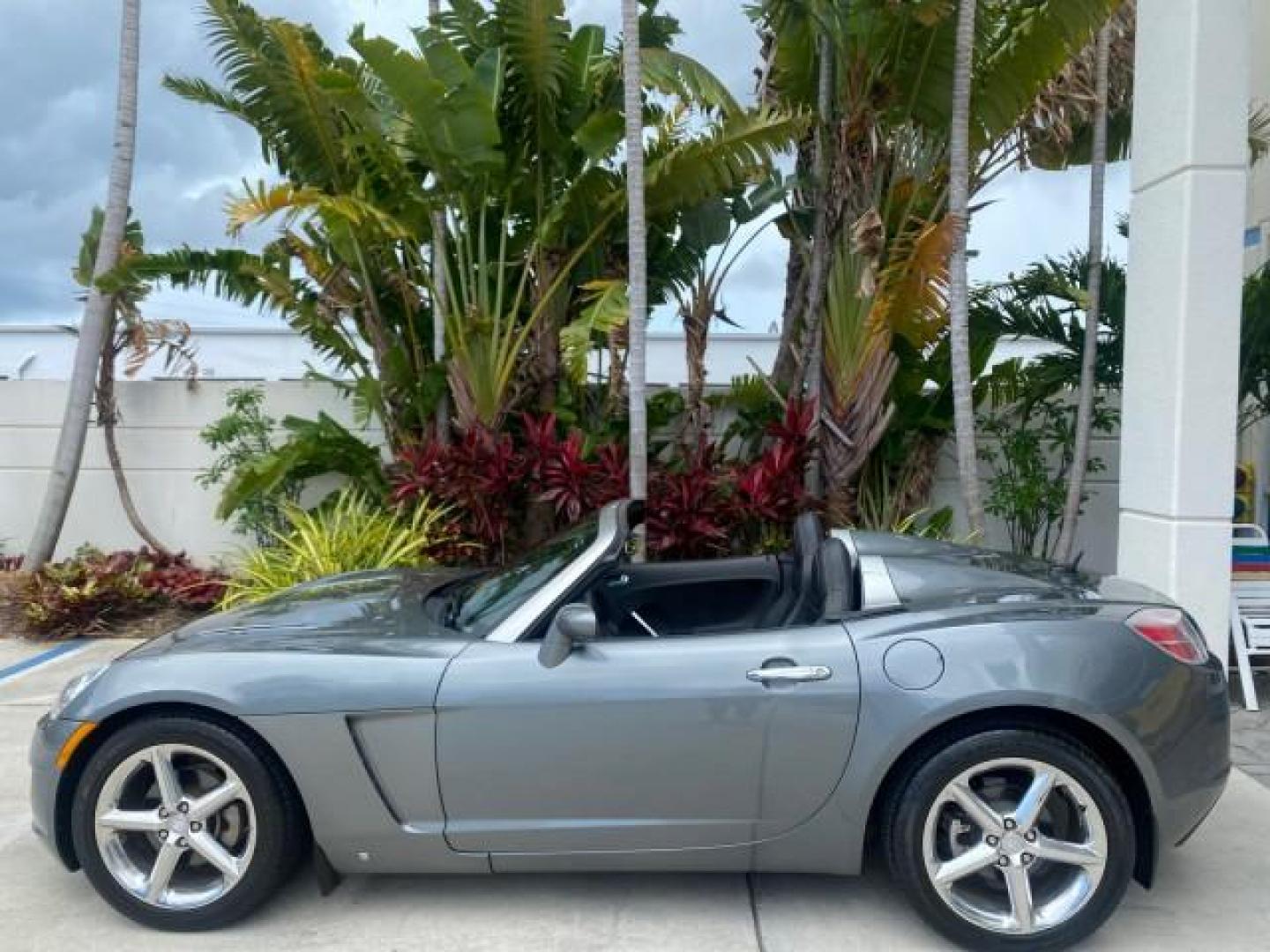 2007 Silver Graphite /Black Saturn Sky CONV LOW MILES 42,288 1 OWNER (1G8MB35B47Y) with an 2.4L DOHC VVT I4 Aluminum Ecotec Engine engine, Automatic transmission, located at 4701 North Dixie Hwy, Pompano Beach, FL, 33064, (954) 422-2889, 26.240938, -80.123474 - OUR WEBPAGE FLORIDACARS1.COM HAS OVER 100 PHOTOS AND FREE CARFAX LINK 2007 Saturn SKY 1 OWNER Convertible 2.4L I4 F DOHC Gasoline 28 MPG Rear Wheel Drive Features ABS Brakes Air Conditioning Alloy Wheels AM/FM Stereo Automatic Transmission Auxiliary Audio Input CD Audio Cruise Control Leather Seats - Photo#41