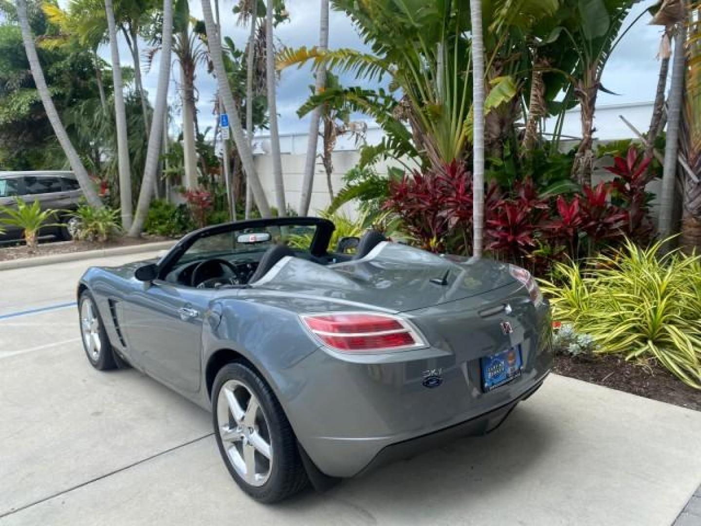 2007 Silver Graphite /Black Saturn Sky CONV LOW MILES 42,288 1 OWNER (1G8MB35B47Y) with an 2.4L DOHC VVT I4 Aluminum Ecotec Engine engine, Automatic transmission, located at 4701 North Dixie Hwy, Pompano Beach, FL, 33064, (954) 422-2889, 26.240938, -80.123474 - OUR WEBPAGE FLORIDACARS1.COM HAS OVER 100 PHOTOS AND FREE CARFAX LINK 2007 Saturn SKY 1 OWNER Convertible 2.4L I4 F DOHC Gasoline 28 MPG Rear Wheel Drive Features ABS Brakes Air Conditioning Alloy Wheels AM/FM Stereo Automatic Transmission Auxiliary Audio Input CD Audio Cruise Control Leather Seats - Photo#42