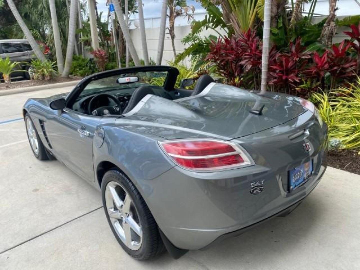 2007 Silver Graphite /Black Saturn Sky CONV LOW MILES 42,288 1 OWNER (1G8MB35B47Y) with an 2.4L DOHC VVT I4 Aluminum Ecotec Engine engine, Automatic transmission, located at 4701 North Dixie Hwy, Pompano Beach, FL, 33064, (954) 422-2889, 26.240938, -80.123474 - OUR WEBPAGE FLORIDACARS1.COM HAS OVER 100 PHOTOS AND FREE CARFAX LINK 2007 Saturn SKY 1 OWNER Convertible 2.4L I4 F DOHC Gasoline 28 MPG Rear Wheel Drive Features ABS Brakes Air Conditioning Alloy Wheels AM/FM Stereo Automatic Transmission Auxiliary Audio Input CD Audio Cruise Control Leather Seats - Photo#43