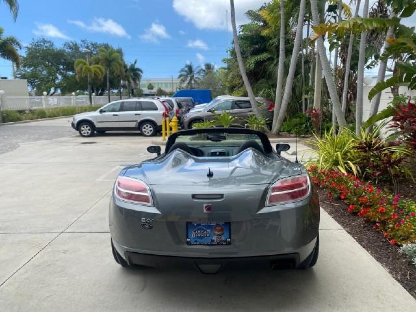 2007 Silver Graphite /Black Saturn Sky CONV LOW MILES 42,288 1 OWNER (1G8MB35B47Y) with an 2.4L DOHC VVT I4 Aluminum Ecotec Engine engine, Automatic transmission, located at 4701 North Dixie Hwy, Pompano Beach, FL, 33064, (954) 422-2889, 26.240938, -80.123474 - OUR WEBPAGE FLORIDACARS1.COM HAS OVER 100 PHOTOS AND FREE CARFAX LINK 2007 Saturn SKY 1 OWNER Convertible 2.4L I4 F DOHC Gasoline 28 MPG Rear Wheel Drive Features ABS Brakes Air Conditioning Alloy Wheels AM/FM Stereo Automatic Transmission Auxiliary Audio Input CD Audio Cruise Control Leather Seats - Photo#44