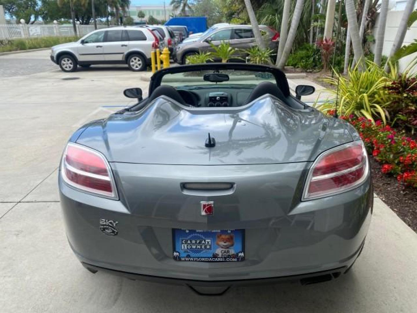 2007 Silver Graphite /Black Saturn Sky CONV LOW MILES 42,288 1 OWNER (1G8MB35B47Y) with an 2.4L DOHC VVT I4 Aluminum Ecotec Engine engine, Automatic transmission, located at 4701 North Dixie Hwy, Pompano Beach, FL, 33064, (954) 422-2889, 26.240938, -80.123474 - OUR WEBPAGE FLORIDACARS1.COM HAS OVER 100 PHOTOS AND FREE CARFAX LINK 2007 Saturn SKY 1 OWNER Convertible 2.4L I4 F DOHC Gasoline 28 MPG Rear Wheel Drive Features ABS Brakes Air Conditioning Alloy Wheels AM/FM Stereo Automatic Transmission Auxiliary Audio Input CD Audio Cruise Control Leather Seats - Photo#45