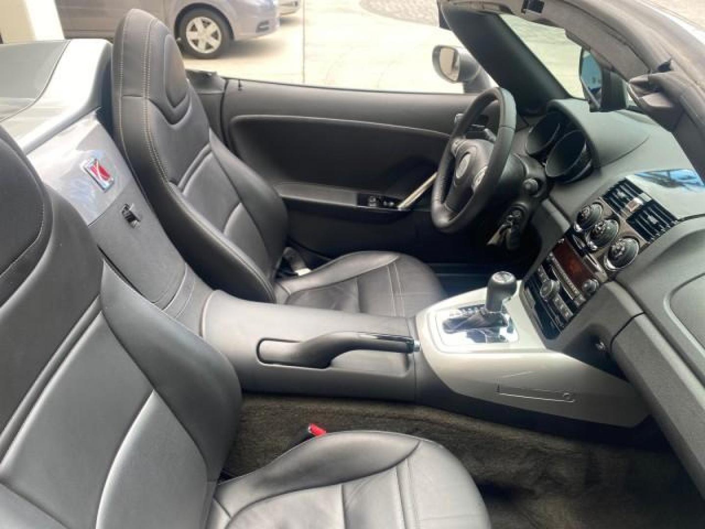 2007 Silver Graphite /Black Saturn Sky CONV LOW MILES 42,288 1 OWNER (1G8MB35B47Y) with an 2.4L DOHC VVT I4 Aluminum Ecotec Engine engine, Automatic transmission, located at 4701 North Dixie Hwy, Pompano Beach, FL, 33064, (954) 422-2889, 26.240938, -80.123474 - OUR WEBPAGE FLORIDACARS1.COM HAS OVER 100 PHOTOS AND FREE CARFAX LINK 2007 Saturn SKY 1 OWNER Convertible 2.4L I4 F DOHC Gasoline 28 MPG Rear Wheel Drive Features ABS Brakes Air Conditioning Alloy Wheels AM/FM Stereo Automatic Transmission Auxiliary Audio Input CD Audio Cruise Control Leather Seats - Photo#52