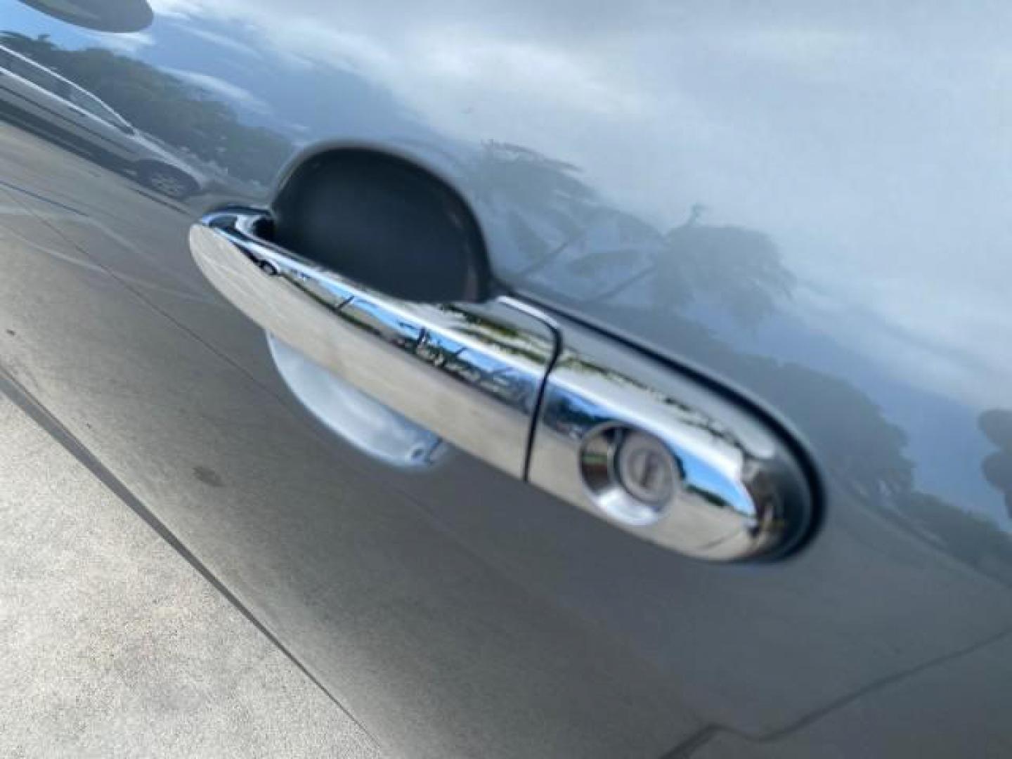 2007 Silver Graphite /Black Saturn Sky CONV LOW MILES 42,288 1 OWNER (1G8MB35B47Y) with an 2.4L DOHC VVT I4 Aluminum Ecotec Engine engine, Automatic transmission, located at 4701 North Dixie Hwy, Pompano Beach, FL, 33064, (954) 422-2889, 26.240938, -80.123474 - OUR WEBPAGE FLORIDACARS1.COM HAS OVER 100 PHOTOS AND FREE CARFAX LINK 2007 Saturn SKY 1 OWNER Convertible 2.4L I4 F DOHC Gasoline 28 MPG Rear Wheel Drive Features ABS Brakes Air Conditioning Alloy Wheels AM/FM Stereo Automatic Transmission Auxiliary Audio Input CD Audio Cruise Control Leather Seats - Photo#57