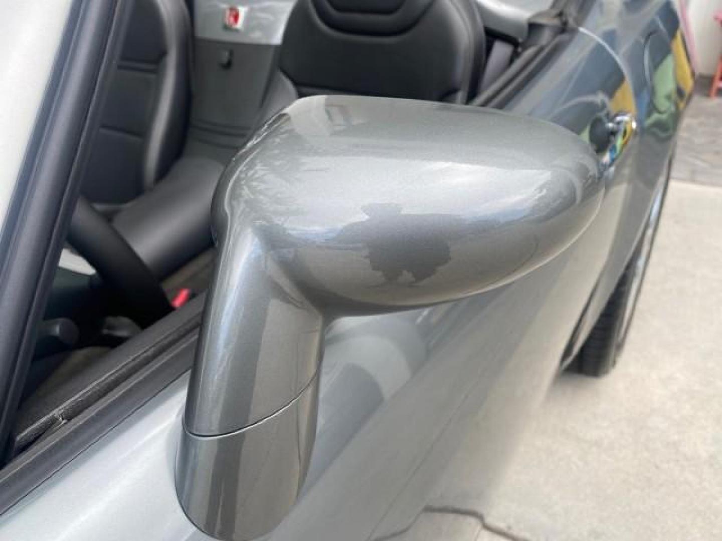 2007 Silver Graphite /Black Saturn Sky CONV LOW MILES 42,288 1 OWNER (1G8MB35B47Y) with an 2.4L DOHC VVT I4 Aluminum Ecotec Engine engine, Automatic transmission, located at 4701 North Dixie Hwy, Pompano Beach, FL, 33064, (954) 422-2889, 26.240938, -80.123474 - OUR WEBPAGE FLORIDACARS1.COM HAS OVER 100 PHOTOS AND FREE CARFAX LINK 2007 Saturn SKY 1 OWNER Convertible 2.4L I4 F DOHC Gasoline 28 MPG Rear Wheel Drive Features ABS Brakes Air Conditioning Alloy Wheels AM/FM Stereo Automatic Transmission Auxiliary Audio Input CD Audio Cruise Control Leather Seats - Photo#59