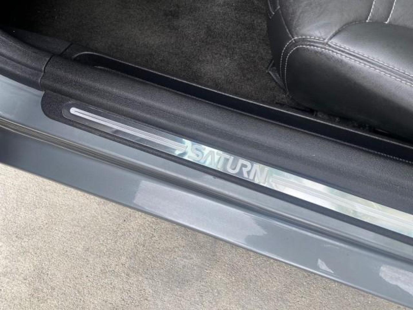 2007 Silver Graphite /Black Saturn Sky CONV LOW MILES 42,288 1 OWNER (1G8MB35B47Y) with an 2.4L DOHC VVT I4 Aluminum Ecotec Engine engine, Automatic transmission, located at 4701 North Dixie Hwy, Pompano Beach, FL, 33064, (954) 422-2889, 26.240938, -80.123474 - OUR WEBPAGE FLORIDACARS1.COM HAS OVER 100 PHOTOS AND FREE CARFAX LINK 2007 Saturn SKY 1 OWNER Convertible 2.4L I4 F DOHC Gasoline 28 MPG Rear Wheel Drive Features ABS Brakes Air Conditioning Alloy Wheels AM/FM Stereo Automatic Transmission Auxiliary Audio Input CD Audio Cruise Control Leather Seats - Photo#62