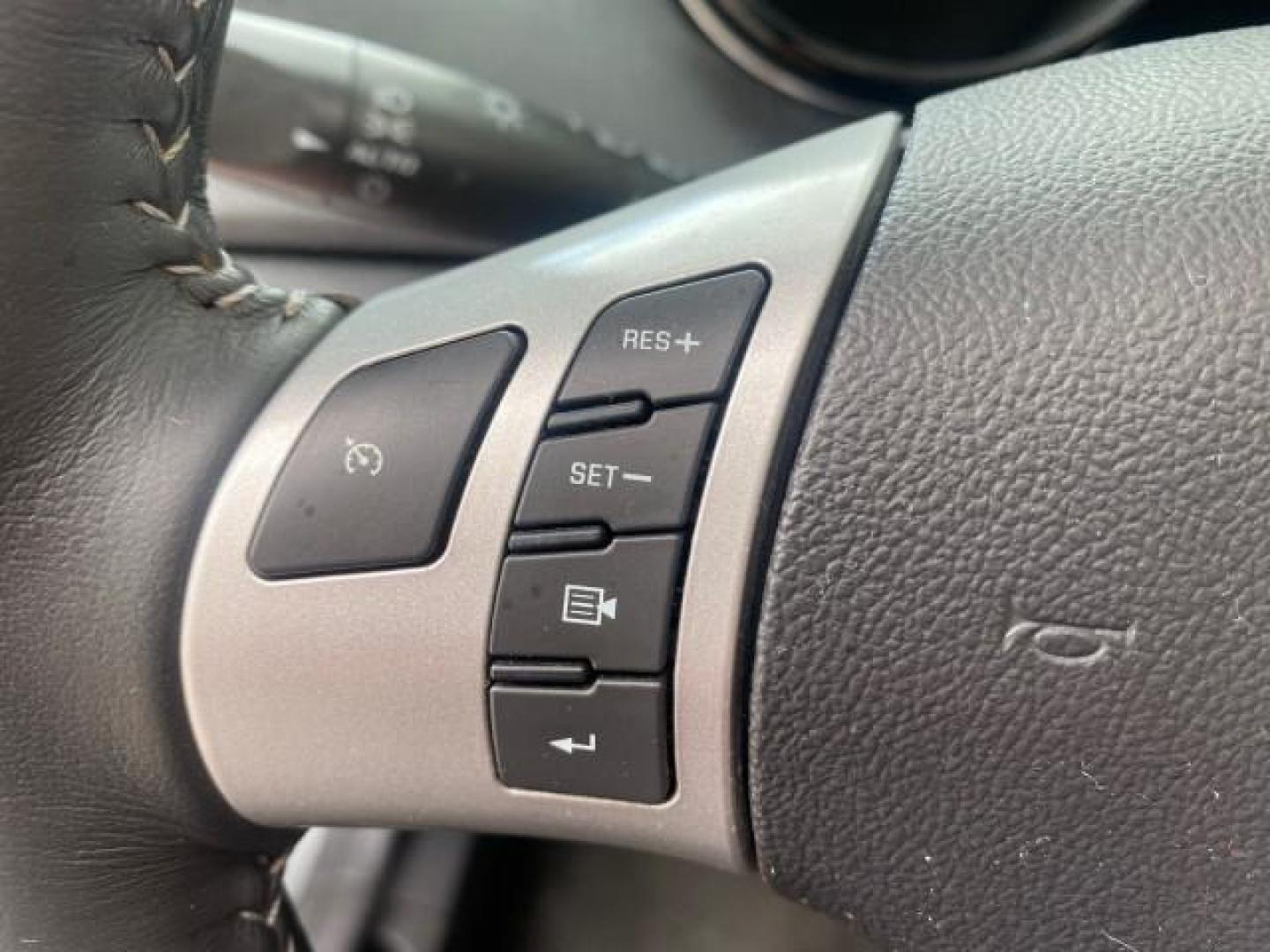 2007 Silver Graphite /Black Saturn Sky CONV LOW MILES 42,288 1 OWNER (1G8MB35B47Y) with an 2.4L DOHC VVT I4 Aluminum Ecotec Engine engine, Automatic transmission, located at 4701 North Dixie Hwy, Pompano Beach, FL, 33064, (954) 422-2889, 26.240938, -80.123474 - OUR WEBPAGE FLORIDACARS1.COM HAS OVER 100 PHOTOS AND FREE CARFAX LINK 2007 Saturn SKY 1 OWNER Convertible 2.4L I4 F DOHC Gasoline 28 MPG Rear Wheel Drive Features ABS Brakes Air Conditioning Alloy Wheels AM/FM Stereo Automatic Transmission Auxiliary Audio Input CD Audio Cruise Control Leather Seats - Photo#70