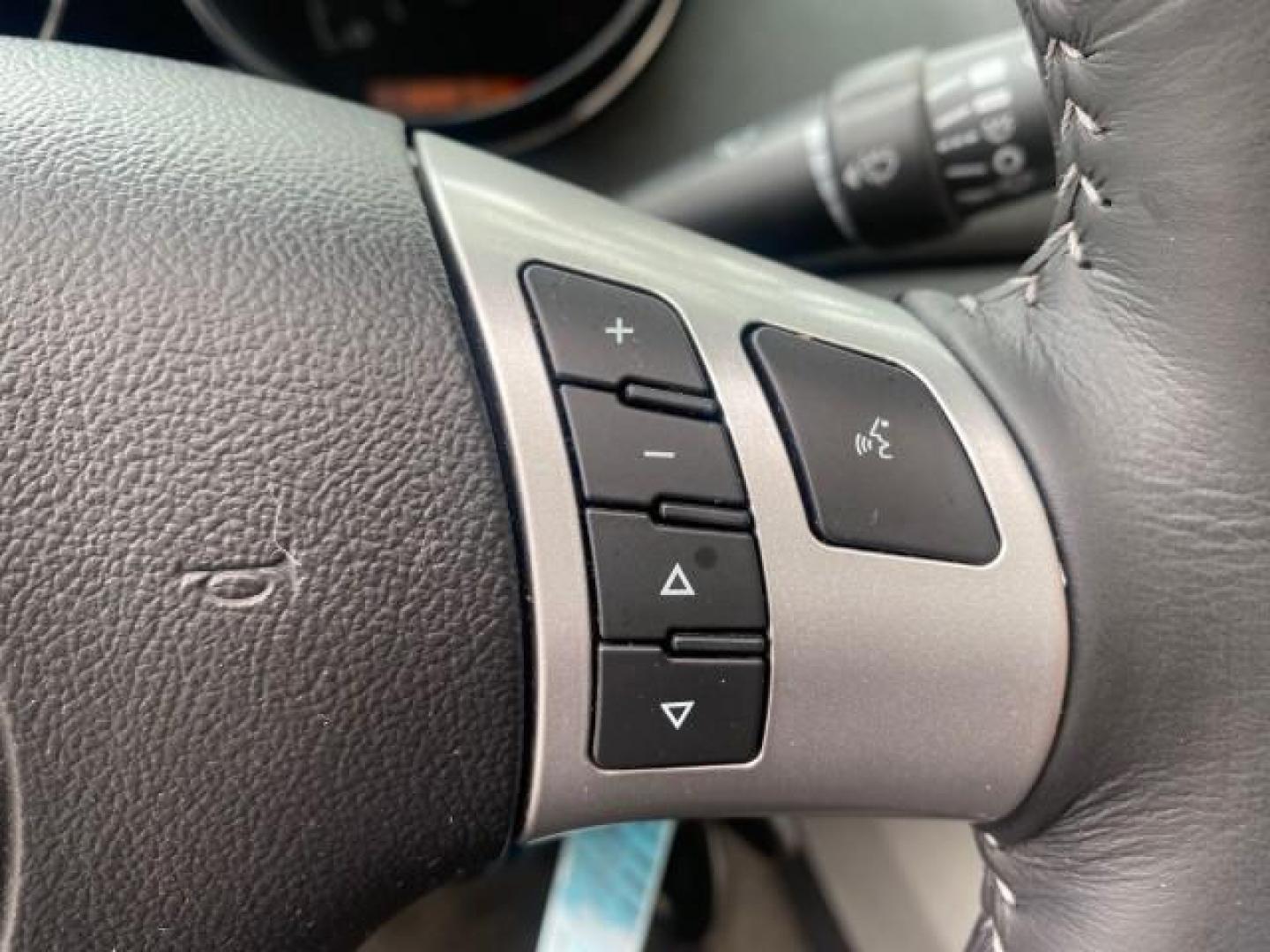 2007 Silver Graphite /Black Saturn Sky CONV LOW MILES 42,288 1 OWNER (1G8MB35B47Y) with an 2.4L DOHC VVT I4 Aluminum Ecotec Engine engine, Automatic transmission, located at 4701 North Dixie Hwy, Pompano Beach, FL, 33064, (954) 422-2889, 26.240938, -80.123474 - OUR WEBPAGE FLORIDACARS1.COM HAS OVER 100 PHOTOS AND FREE CARFAX LINK 2007 Saturn SKY 1 OWNER Convertible 2.4L I4 F DOHC Gasoline 28 MPG Rear Wheel Drive Features ABS Brakes Air Conditioning Alloy Wheels AM/FM Stereo Automatic Transmission Auxiliary Audio Input CD Audio Cruise Control Leather Seats - Photo#71