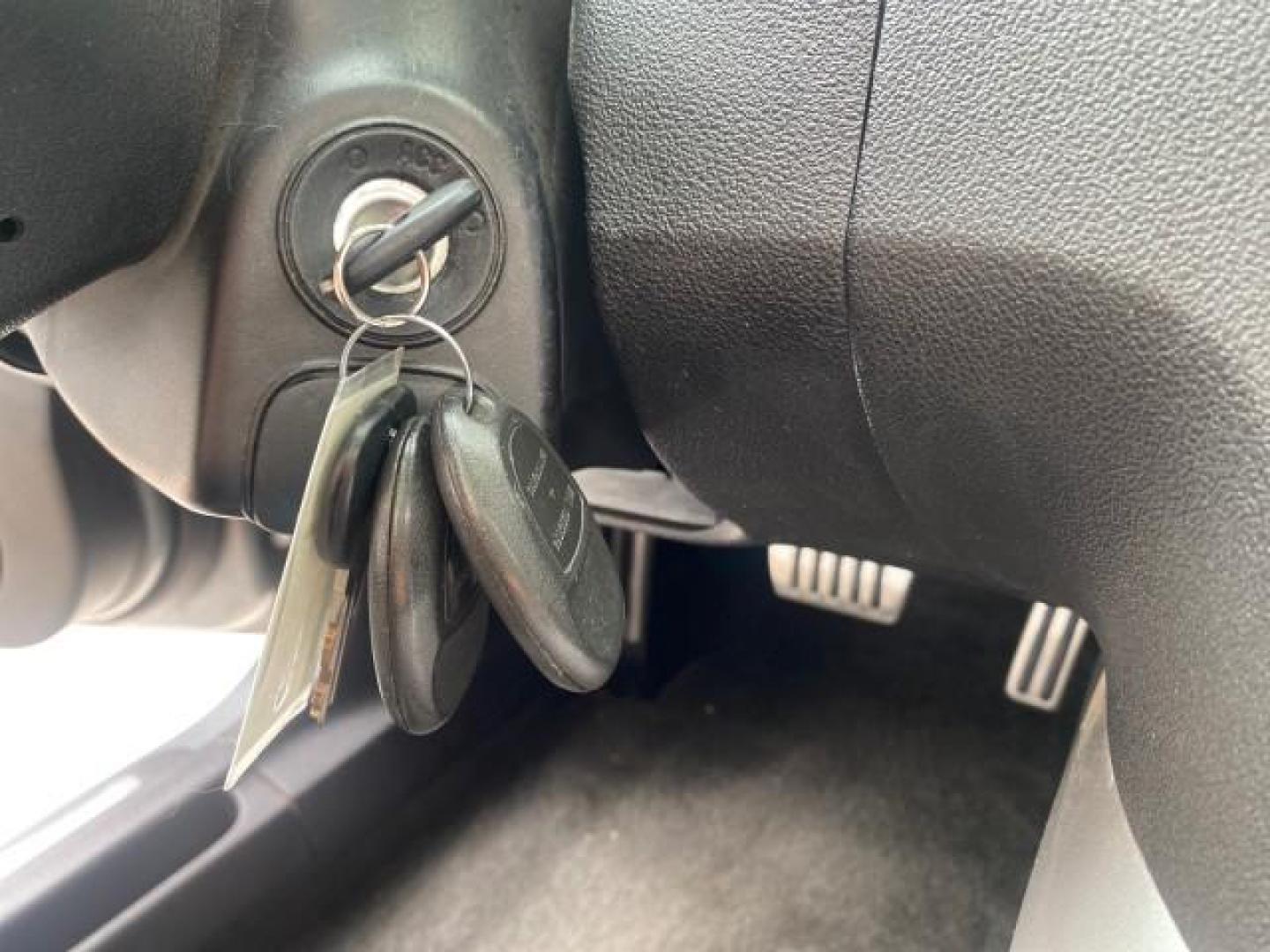 2007 Silver Graphite /Black Saturn Sky CONV LOW MILES 42,288 1 OWNER (1G8MB35B47Y) with an 2.4L DOHC VVT I4 Aluminum Ecotec Engine engine, Automatic transmission, located at 4701 North Dixie Hwy, Pompano Beach, FL, 33064, (954) 422-2889, 26.240938, -80.123474 - OUR WEBPAGE FLORIDACARS1.COM HAS OVER 100 PHOTOS AND FREE CARFAX LINK 2007 Saturn SKY 1 OWNER Convertible 2.4L I4 F DOHC Gasoline 28 MPG Rear Wheel Drive Features ABS Brakes Air Conditioning Alloy Wheels AM/FM Stereo Automatic Transmission Auxiliary Audio Input CD Audio Cruise Control Leather Seats - Photo#76