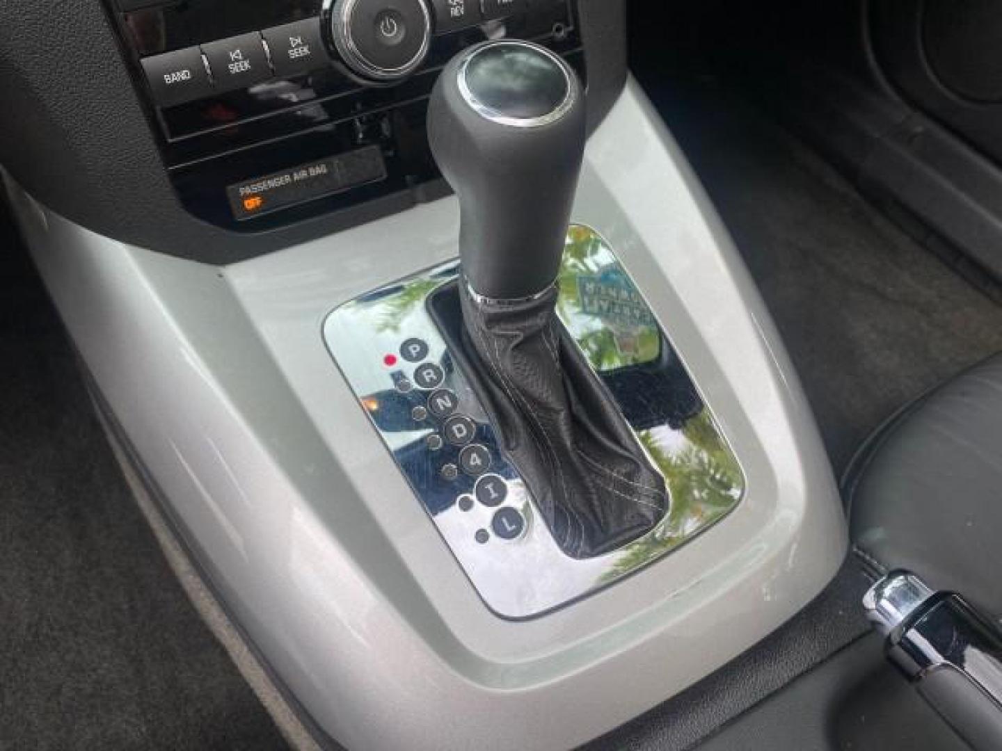 2007 Silver Graphite /Black Saturn Sky CONV LOW MILES 42,288 1 OWNER (1G8MB35B47Y) with an 2.4L DOHC VVT I4 Aluminum Ecotec Engine engine, Automatic transmission, located at 4701 North Dixie Hwy, Pompano Beach, FL, 33064, (954) 422-2889, 26.240938, -80.123474 - OUR WEBPAGE FLORIDACARS1.COM HAS OVER 100 PHOTOS AND FREE CARFAX LINK 2007 Saturn SKY 1 OWNER Convertible 2.4L I4 F DOHC Gasoline 28 MPG Rear Wheel Drive Features ABS Brakes Air Conditioning Alloy Wheels AM/FM Stereo Automatic Transmission Auxiliary Audio Input CD Audio Cruise Control Leather Seats - Photo#81