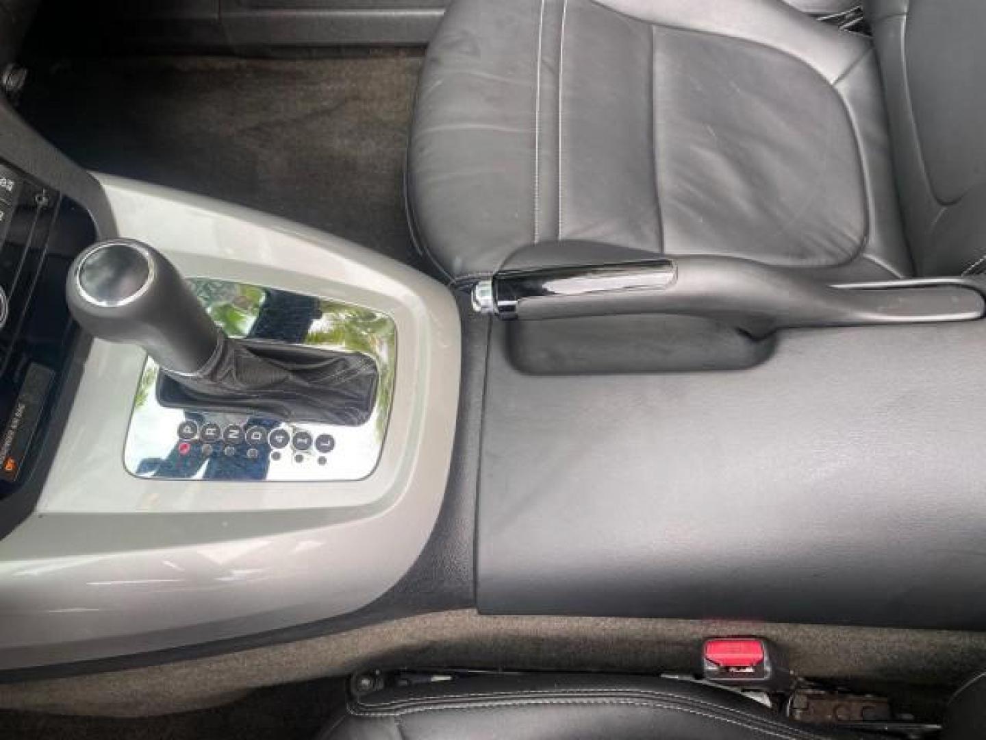 2007 Silver Graphite /Black Saturn Sky CONV LOW MILES 42,288 1 OWNER (1G8MB35B47Y) with an 2.4L DOHC VVT I4 Aluminum Ecotec Engine engine, Automatic transmission, located at 4701 North Dixie Hwy, Pompano Beach, FL, 33064, (954) 422-2889, 26.240938, -80.123474 - OUR WEBPAGE FLORIDACARS1.COM HAS OVER 100 PHOTOS AND FREE CARFAX LINK 2007 Saturn SKY 1 OWNER Convertible 2.4L I4 F DOHC Gasoline 28 MPG Rear Wheel Drive Features ABS Brakes Air Conditioning Alloy Wheels AM/FM Stereo Automatic Transmission Auxiliary Audio Input CD Audio Cruise Control Leather Seats - Photo#82