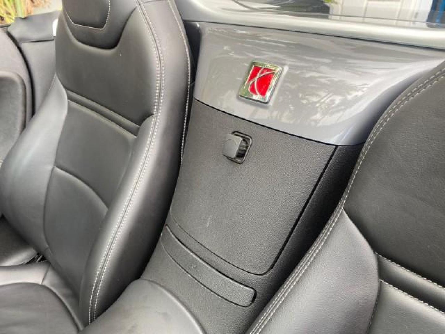 2007 Silver Graphite /Black Saturn Sky CONV LOW MILES 42,288 1 OWNER (1G8MB35B47Y) with an 2.4L DOHC VVT I4 Aluminum Ecotec Engine engine, Automatic transmission, located at 4701 North Dixie Hwy, Pompano Beach, FL, 33064, (954) 422-2889, 26.240938, -80.123474 - OUR WEBPAGE FLORIDACARS1.COM HAS OVER 100 PHOTOS AND FREE CARFAX LINK 2007 Saturn SKY 1 OWNER Convertible 2.4L I4 F DOHC Gasoline 28 MPG Rear Wheel Drive Features ABS Brakes Air Conditioning Alloy Wheels AM/FM Stereo Automatic Transmission Auxiliary Audio Input CD Audio Cruise Control Leather Seats - Photo#83