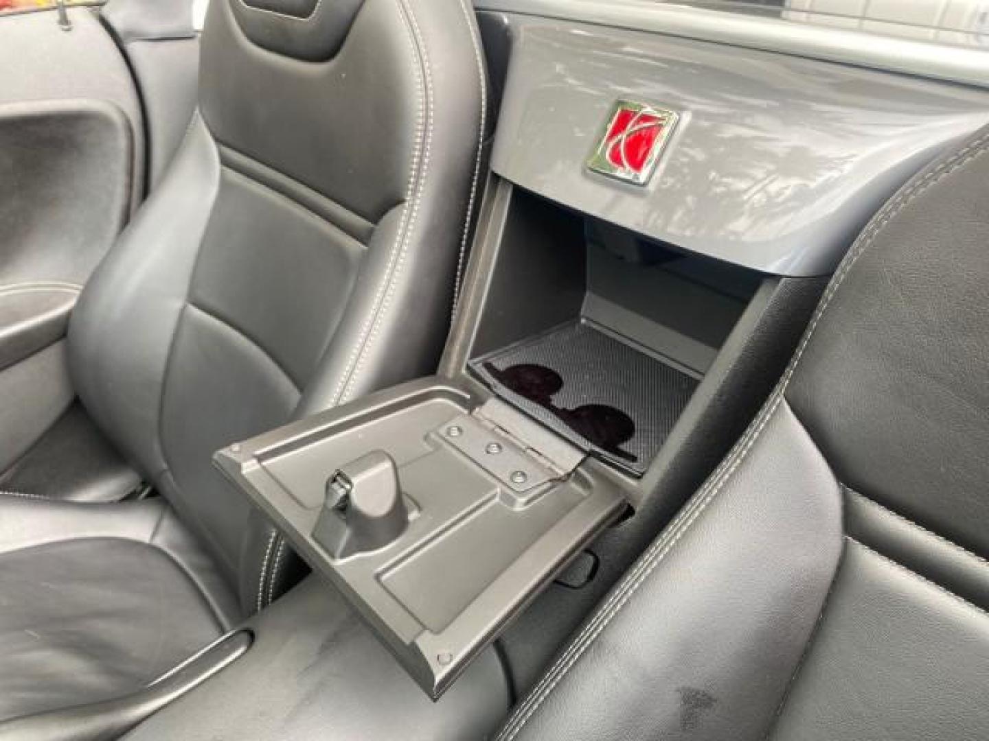 2007 Silver Graphite /Black Saturn Sky CONV LOW MILES 42,288 1 OWNER (1G8MB35B47Y) with an 2.4L DOHC VVT I4 Aluminum Ecotec Engine engine, Automatic transmission, located at 4701 North Dixie Hwy, Pompano Beach, FL, 33064, (954) 422-2889, 26.240938, -80.123474 - OUR WEBPAGE FLORIDACARS1.COM HAS OVER 100 PHOTOS AND FREE CARFAX LINK 2007 Saturn SKY 1 OWNER Convertible 2.4L I4 F DOHC Gasoline 28 MPG Rear Wheel Drive Features ABS Brakes Air Conditioning Alloy Wheels AM/FM Stereo Automatic Transmission Auxiliary Audio Input CD Audio Cruise Control Leather Seats - Photo#84