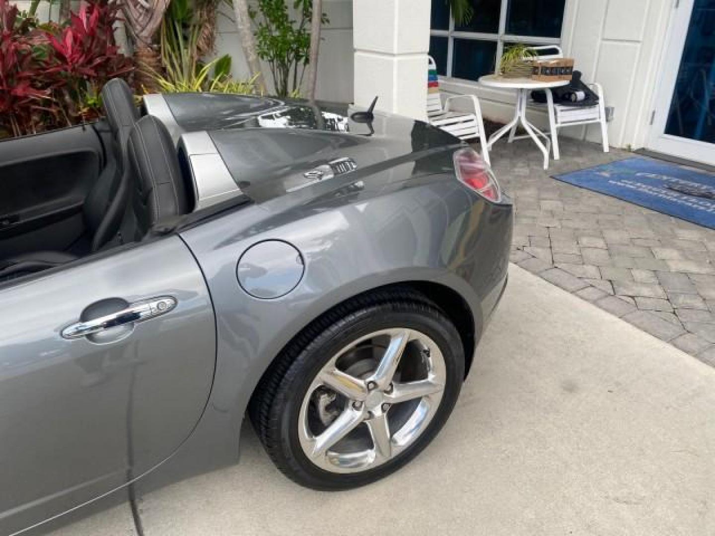 2007 Silver Graphite /Black Saturn Sky CONV LOW MILES 42,288 1 OWNER (1G8MB35B47Y) with an 2.4L DOHC VVT I4 Aluminum Ecotec Engine engine, Automatic transmission, located at 4701 North Dixie Hwy, Pompano Beach, FL, 33064, (954) 422-2889, 26.240938, -80.123474 - OUR WEBPAGE FLORIDACARS1.COM HAS OVER 100 PHOTOS AND FREE CARFAX LINK 2007 Saturn SKY 1 OWNER Convertible 2.4L I4 F DOHC Gasoline 28 MPG Rear Wheel Drive Features ABS Brakes Air Conditioning Alloy Wheels AM/FM Stereo Automatic Transmission Auxiliary Audio Input CD Audio Cruise Control Leather Seats - Photo#91