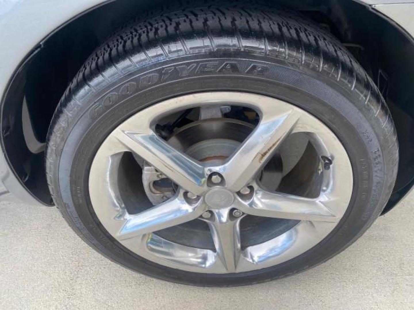 2007 Silver Graphite /Black Saturn Sky CONV LOW MILES 42,288 1 OWNER (1G8MB35B47Y) with an 2.4L DOHC VVT I4 Aluminum Ecotec Engine engine, Automatic transmission, located at 4701 North Dixie Hwy, Pompano Beach, FL, 33064, (954) 422-2889, 26.240938, -80.123474 - OUR WEBPAGE FLORIDACARS1.COM HAS OVER 100 PHOTOS AND FREE CARFAX LINK 2007 Saturn SKY 1 OWNER Convertible 2.4L I4 F DOHC Gasoline 28 MPG Rear Wheel Drive Features ABS Brakes Air Conditioning Alloy Wheels AM/FM Stereo Automatic Transmission Auxiliary Audio Input CD Audio Cruise Control Leather Seats - Photo#94