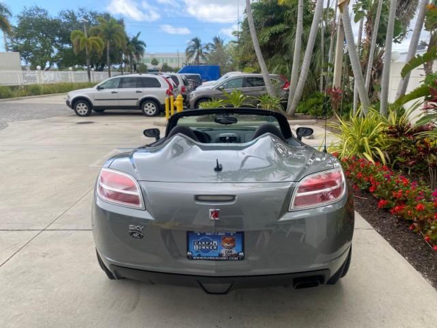 2007 Silver Graphite /Black Saturn Sky CONV LOW MILES 42,288 1 OWNER (1G8MB35B47Y) with an 2.4L DOHC VVT I4 Aluminum Ecotec Engine engine, Automatic transmission, located at 4701 North Dixie Hwy, Pompano Beach, FL, 33064, (954) 422-2889, 26.240938, -80.123474 - OUR WEBPAGE FLORIDACARS1.COM HAS OVER 100 PHOTOS AND FREE CARFAX LINK 2007 Saturn SKY 1 OWNER Convertible 2.4L I4 F DOHC Gasoline 28 MPG Rear Wheel Drive Features ABS Brakes Air Conditioning Alloy Wheels AM/FM Stereo Automatic Transmission Auxiliary Audio Input CD Audio Cruise Control Leather Seats - Photo#97