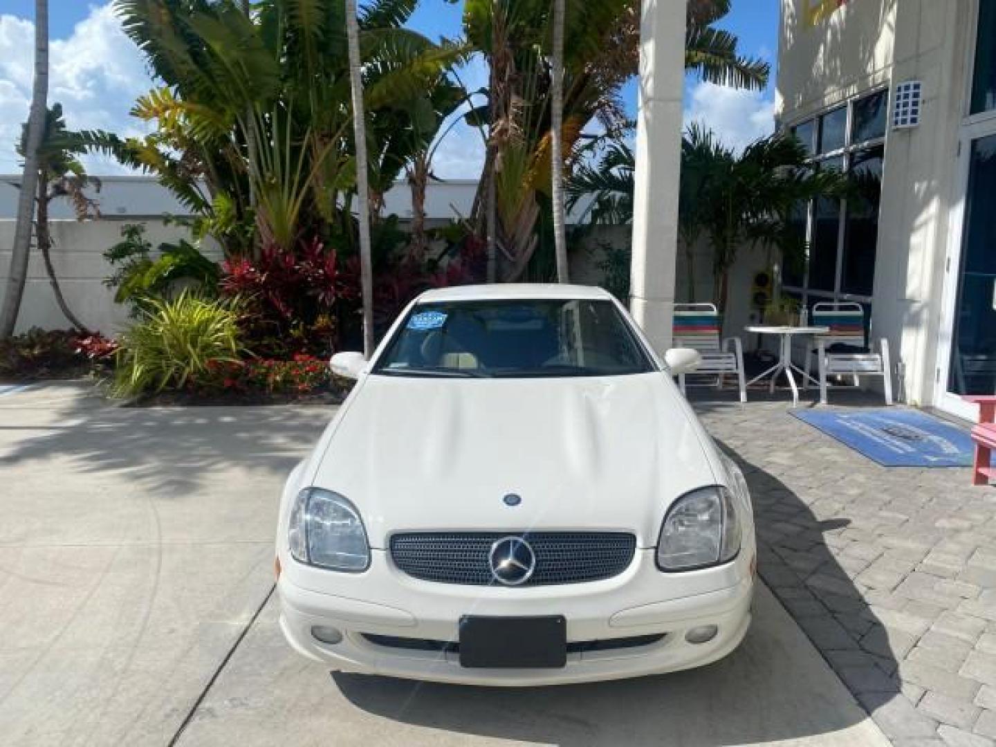 2002 Alabaster White /Charcoal/Beige Mercedes-Benz SLK-Class 2.3L SLK CONV LOW MILES 48,941 (WDBKK49F32F) with an 2.3L Supercharged And Intercooled DOHC SMPI 16-Valve In-Line 4-Cyl Engine engine, Automatic transmission, located at 4701 North Dixie Hwy, Pompano Beach, FL, 33064, (954) 422-2889, 26.240938, -80.123474 - OUR WEBPAGE FLORIDACARS1.COM HAS OVER 100 PHOTOS AND FREE CARFAX LINK 2002 Mercedes-Benz SLK 230 Kompressor Convertible 2.3L I4 F DOHC 16V Gasoline 30 MPG Rear Wheel Drive Features ABS Brakes Air Conditioning Alloy Wheels AM/FM Stereo Automatic Transmission BOSE Sound System Cassette Player Cruise C- Photo#2
