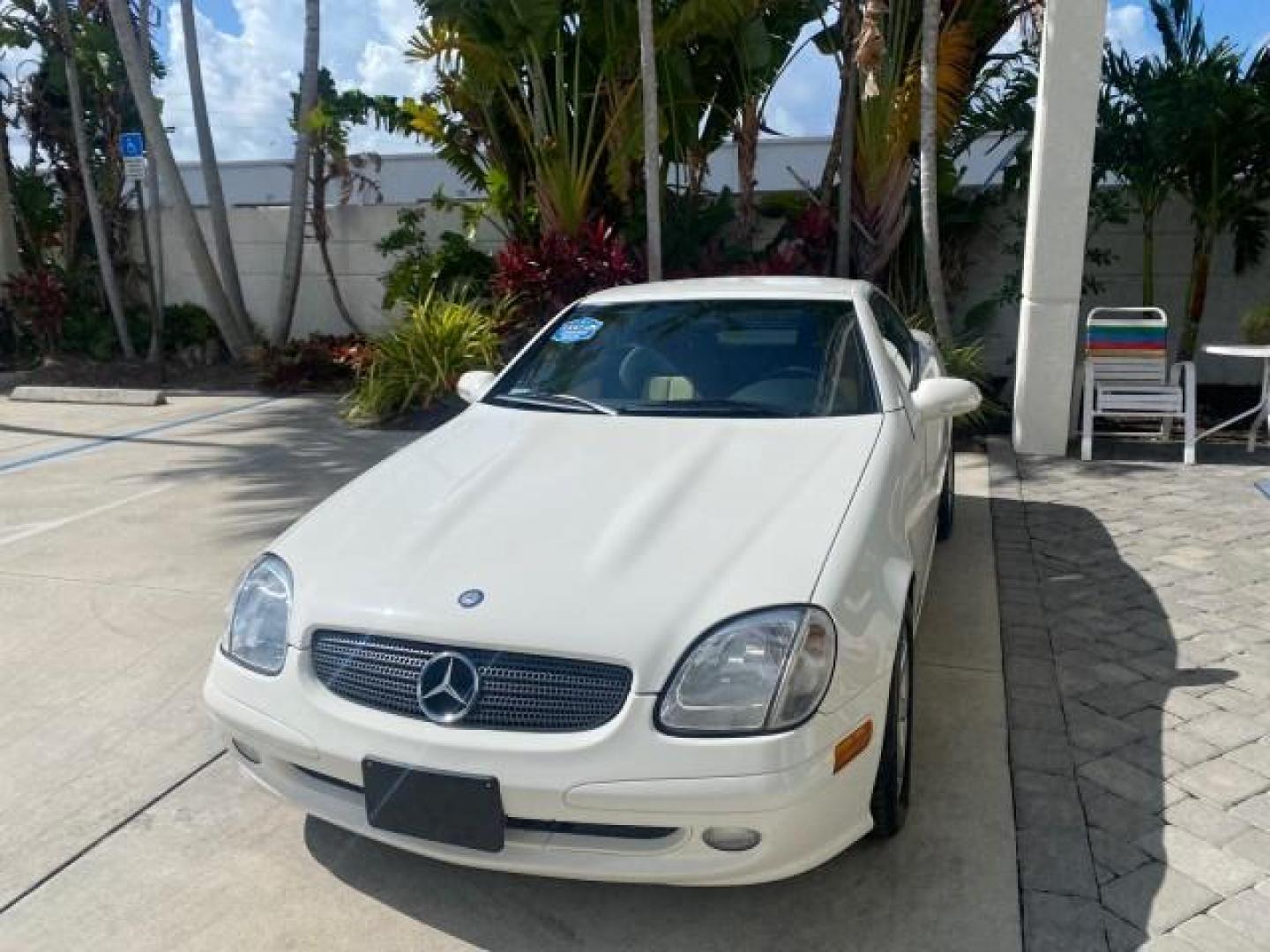 2002 Alabaster White /Charcoal/Beige Mercedes-Benz SLK-Class 2.3L SLK CONV LOW MILES 48,941 (WDBKK49F32F) with an 2.3L Supercharged And Intercooled DOHC SMPI 16-Valve In-Line 4-Cyl Engine engine, Automatic transmission, located at 4701 North Dixie Hwy, Pompano Beach, FL, 33064, (954) 422-2889, 26.240938, -80.123474 - OUR WEBPAGE FLORIDACARS1.COM HAS OVER 100 PHOTOS AND FREE CARFAX LINK 2002 Mercedes-Benz SLK 230 Kompressor Convertible 2.3L I4 F DOHC 16V Gasoline 30 MPG Rear Wheel Drive Features ABS Brakes Air Conditioning Alloy Wheels AM/FM Stereo Automatic Transmission BOSE Sound System Cassette Player Cruise C- Photo#3