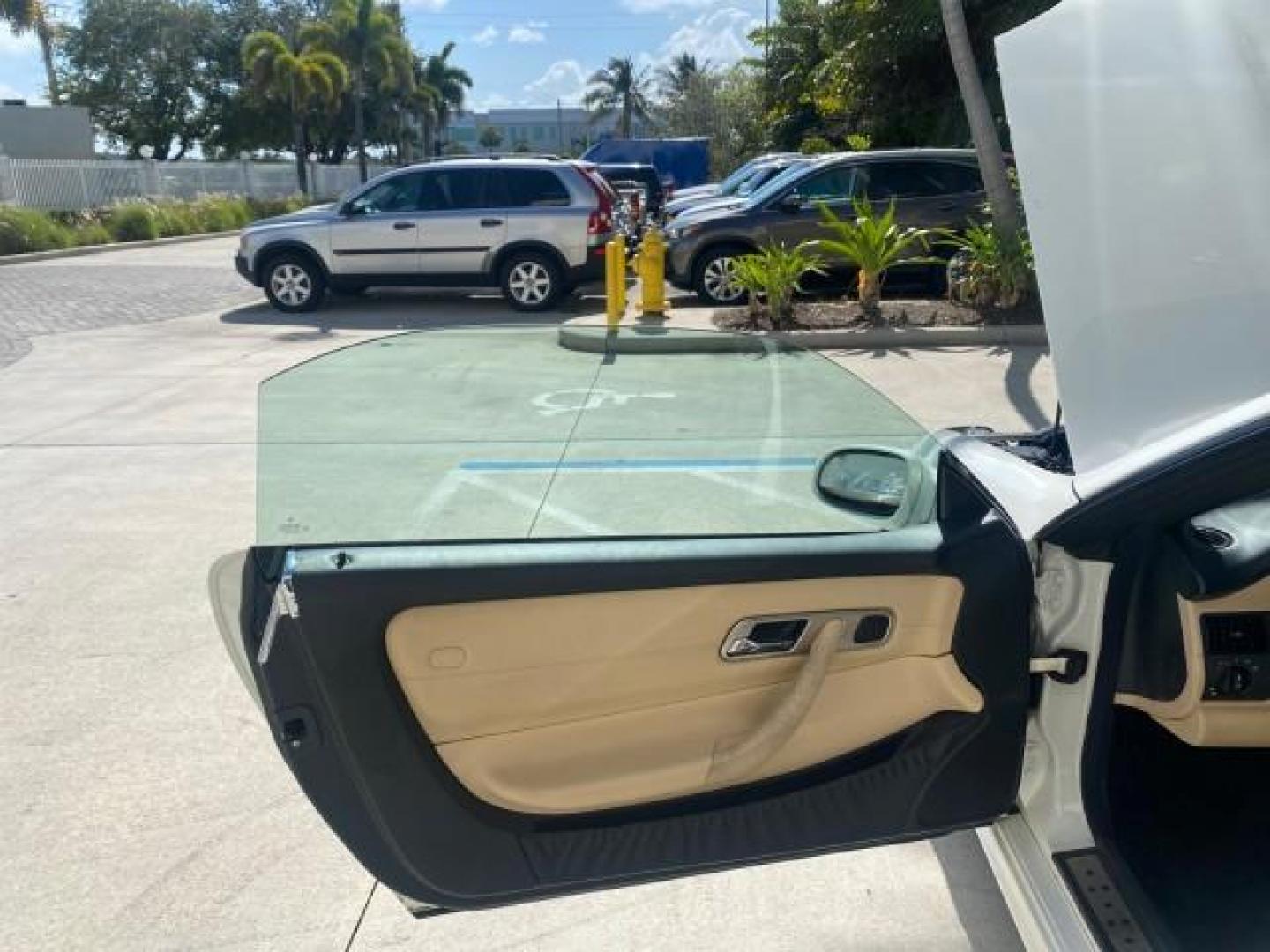 2002 Alabaster White /Charcoal/Beige Mercedes-Benz SLK-Class 2.3L SLK CONV LOW MILES 48,941 (WDBKK49F32F) with an 2.3L Supercharged And Intercooled DOHC SMPI 16-Valve In-Line 4-Cyl Engine engine, Automatic transmission, located at 4701 North Dixie Hwy, Pompano Beach, FL, 33064, (954) 422-2889, 26.240938, -80.123474 - OUR WEBPAGE FLORIDACARS1.COM HAS OVER 100 PHOTOS AND FREE CARFAX LINK 2002 Mercedes-Benz SLK 230 Kompressor Convertible 2.3L I4 F DOHC 16V Gasoline 30 MPG Rear Wheel Drive Features ABS Brakes Air Conditioning Alloy Wheels AM/FM Stereo Automatic Transmission BOSE Sound System Cassette Player Cruise C- Photo#9