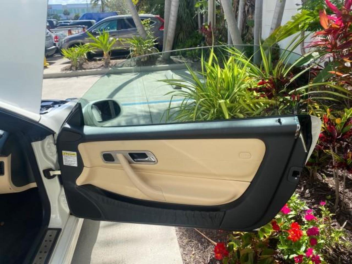 2002 Alabaster White /Charcoal/Beige Mercedes-Benz SLK-Class 2.3L SLK CONV LOW MILES 48,941 (WDBKK49F32F) with an 2.3L Supercharged And Intercooled DOHC SMPI 16-Valve In-Line 4-Cyl Engine engine, Automatic transmission, located at 4701 North Dixie Hwy, Pompano Beach, FL, 33064, (954) 422-2889, 26.240938, -80.123474 - OUR WEBPAGE FLORIDACARS1.COM HAS OVER 100 PHOTOS AND FREE CARFAX LINK 2002 Mercedes-Benz SLK 230 Kompressor Convertible 2.3L I4 F DOHC 16V Gasoline 30 MPG Rear Wheel Drive Features ABS Brakes Air Conditioning Alloy Wheels AM/FM Stereo Automatic Transmission BOSE Sound System Cassette Player Cruise C- Photo#11