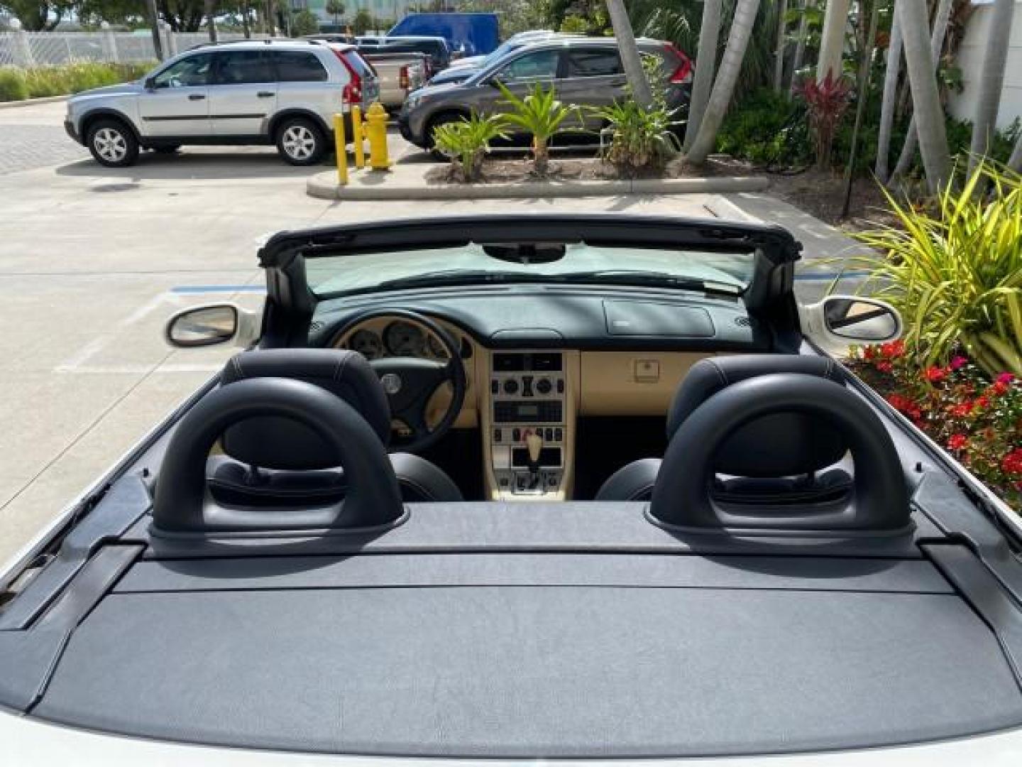 2002 Alabaster White /Charcoal/Beige Mercedes-Benz SLK-Class 2.3L SLK CONV LOW MILES 48,941 (WDBKK49F32F) with an 2.3L Supercharged And Intercooled DOHC SMPI 16-Valve In-Line 4-Cyl Engine engine, Automatic transmission, located at 4701 North Dixie Hwy, Pompano Beach, FL, 33064, (954) 422-2889, 26.240938, -80.123474 - OUR WEBPAGE FLORIDACARS1.COM HAS OVER 100 PHOTOS AND FREE CARFAX LINK 2002 Mercedes-Benz SLK 230 Kompressor Convertible 2.3L I4 F DOHC 16V Gasoline 30 MPG Rear Wheel Drive Features ABS Brakes Air Conditioning Alloy Wheels AM/FM Stereo Automatic Transmission BOSE Sound System Cassette Player Cruise C- Photo#46