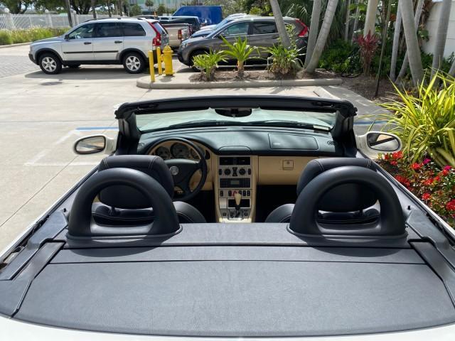 2002 Alabaster White /Charcoal/Beige Mercedes-Benz SLK-Class 2.3L SLK CONV LOW MILES 48,941 (WDBKK49F32F) with an 2.3L Supercharged And Intercooled DOHC SMPI 16-Valve In-Line 4-Cyl Engine engine, Automatic transmission, located at 4701 North Dixie Hwy, Pompano Beach, FL, 33064, (954) 422-2889, 26.240938, -80.123474 - OUR WEBPAGE FLORIDACARS1.COM HAS OVER 100 PHOTOS AND FREE CARFAX LINK 2002 Mercedes-Benz SLK 230 Kompressor Convertible 2.3L I4 F DOHC 16V Gasoline 30 MPG Rear Wheel Drive Features ABS Brakes Air Conditioning Alloy Wheels AM/FM Stereo Automatic Transmission BOSE Sound System Cassette Player Cruise C - Photo#46