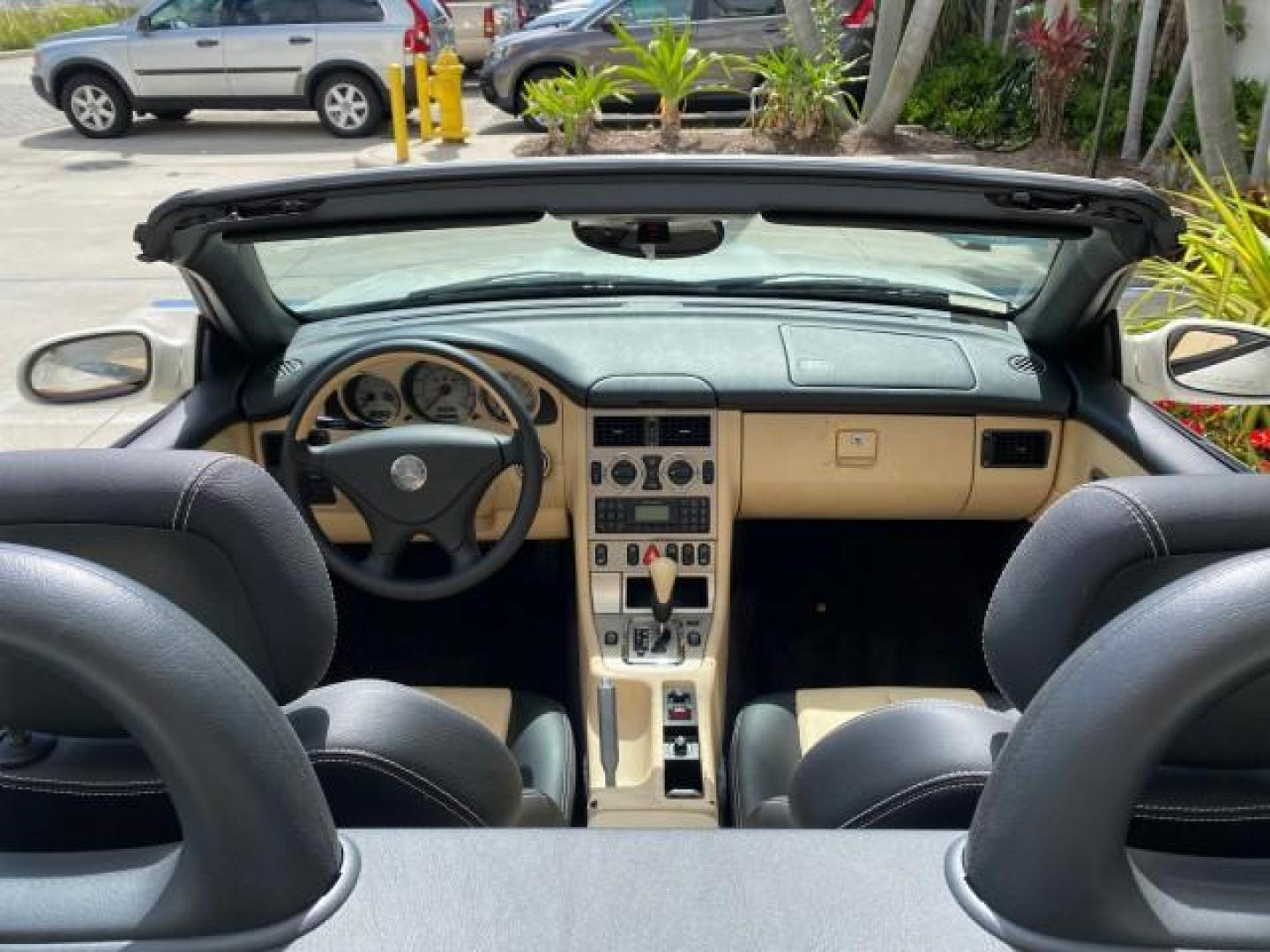 2002 Alabaster White /Charcoal/Beige Mercedes-Benz SLK-Class 2.3L SLK CONV LOW MILES 48,941 (WDBKK49F32F) with an 2.3L Supercharged And Intercooled DOHC SMPI 16-Valve In-Line 4-Cyl Engine engine, Automatic transmission, located at 4701 North Dixie Hwy, Pompano Beach, FL, 33064, (954) 422-2889, 26.240938, -80.123474 - OUR WEBPAGE FLORIDACARS1.COM HAS OVER 100 PHOTOS AND FREE CARFAX LINK 2002 Mercedes-Benz SLK 230 Kompressor Convertible 2.3L I4 F DOHC 16V Gasoline 30 MPG Rear Wheel Drive Features ABS Brakes Air Conditioning Alloy Wheels AM/FM Stereo Automatic Transmission BOSE Sound System Cassette Player Cruise C- Photo#47