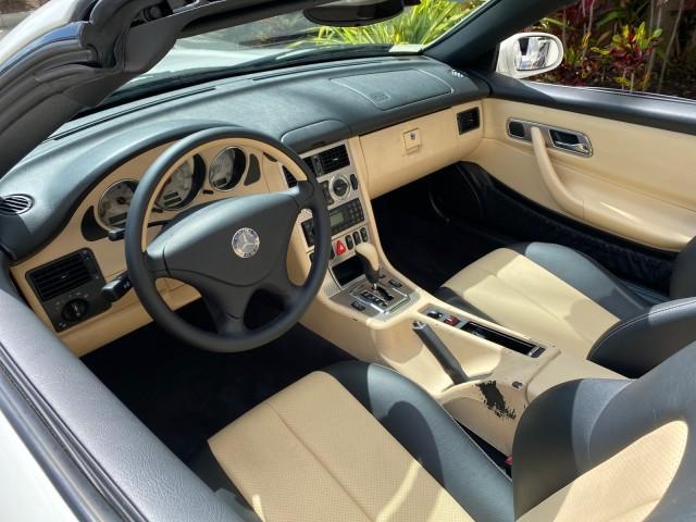 2002 Alabaster White /Charcoal/Beige Mercedes-Benz SLK-Class 2.3L SLK CONV LOW MILES 48,941 (WDBKK49F32F) with an 2.3L Supercharged And Intercooled DOHC SMPI 16-Valve In-Line 4-Cyl Engine engine, Automatic transmission, located at 4701 North Dixie Hwy, Pompano Beach, FL, 33064, (954) 422-2889, 26.240938, -80.123474 - OUR WEBPAGE FLORIDACARS1.COM HAS OVER 100 PHOTOS AND FREE CARFAX LINK 2002 Mercedes-Benz SLK 230 Kompressor Convertible 2.3L I4 F DOHC 16V Gasoline 30 MPG Rear Wheel Drive Features ABS Brakes Air Conditioning Alloy Wheels AM/FM Stereo Automatic Transmission BOSE Sound System Cassette Player Cruise C - Photo#48