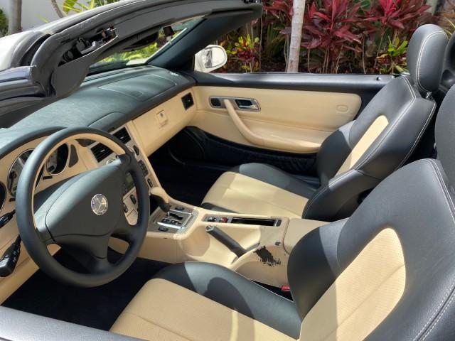 2002 Alabaster White /Charcoal/Beige Mercedes-Benz SLK-Class 2.3L SLK CONV LOW MILES 48,941 (WDBKK49F32F) with an 2.3L Supercharged And Intercooled DOHC SMPI 16-Valve In-Line 4-Cyl Engine engine, Automatic transmission, located at 4701 North Dixie Hwy, Pompano Beach, FL, 33064, (954) 422-2889, 26.240938, -80.123474 - OUR WEBPAGE FLORIDACARS1.COM HAS OVER 100 PHOTOS AND FREE CARFAX LINK 2002 Mercedes-Benz SLK 230 Kompressor Convertible 2.3L I4 F DOHC 16V Gasoline 30 MPG Rear Wheel Drive Features ABS Brakes Air Conditioning Alloy Wheels AM/FM Stereo Automatic Transmission BOSE Sound System Cassette Player Cruise C - Photo#49