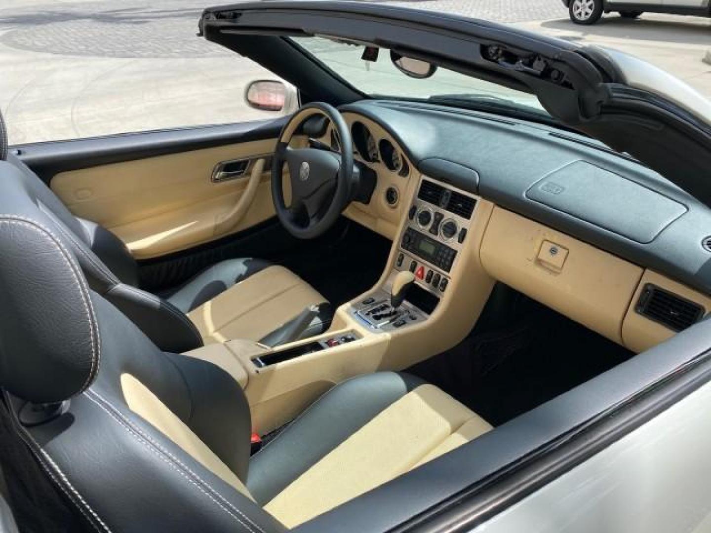 2002 Alabaster White /Charcoal/Beige Mercedes-Benz SLK-Class 2.3L SLK CONV LOW MILES 48,941 (WDBKK49F32F) with an 2.3L Supercharged And Intercooled DOHC SMPI 16-Valve In-Line 4-Cyl Engine engine, Automatic transmission, located at 4701 North Dixie Hwy, Pompano Beach, FL, 33064, (954) 422-2889, 26.240938, -80.123474 - OUR WEBPAGE FLORIDACARS1.COM HAS OVER 100 PHOTOS AND FREE CARFAX LINK 2002 Mercedes-Benz SLK 230 Kompressor Convertible 2.3L I4 F DOHC 16V Gasoline 30 MPG Rear Wheel Drive Features ABS Brakes Air Conditioning Alloy Wheels AM/FM Stereo Automatic Transmission BOSE Sound System Cassette Player Cruise C- Photo#48