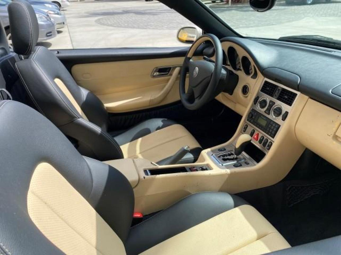2002 Alabaster White /Charcoal/Beige Mercedes-Benz SLK-Class 2.3L SLK CONV LOW MILES 48,941 (WDBKK49F32F) with an 2.3L Supercharged And Intercooled DOHC SMPI 16-Valve In-Line 4-Cyl Engine engine, Automatic transmission, located at 4701 North Dixie Hwy, Pompano Beach, FL, 33064, (954) 422-2889, 26.240938, -80.123474 - OUR WEBPAGE FLORIDACARS1.COM HAS OVER 100 PHOTOS AND FREE CARFAX LINK 2002 Mercedes-Benz SLK 230 Kompressor Convertible 2.3L I4 F DOHC 16V Gasoline 30 MPG Rear Wheel Drive Features ABS Brakes Air Conditioning Alloy Wheels AM/FM Stereo Automatic Transmission BOSE Sound System Cassette Player Cruise C- Photo#49