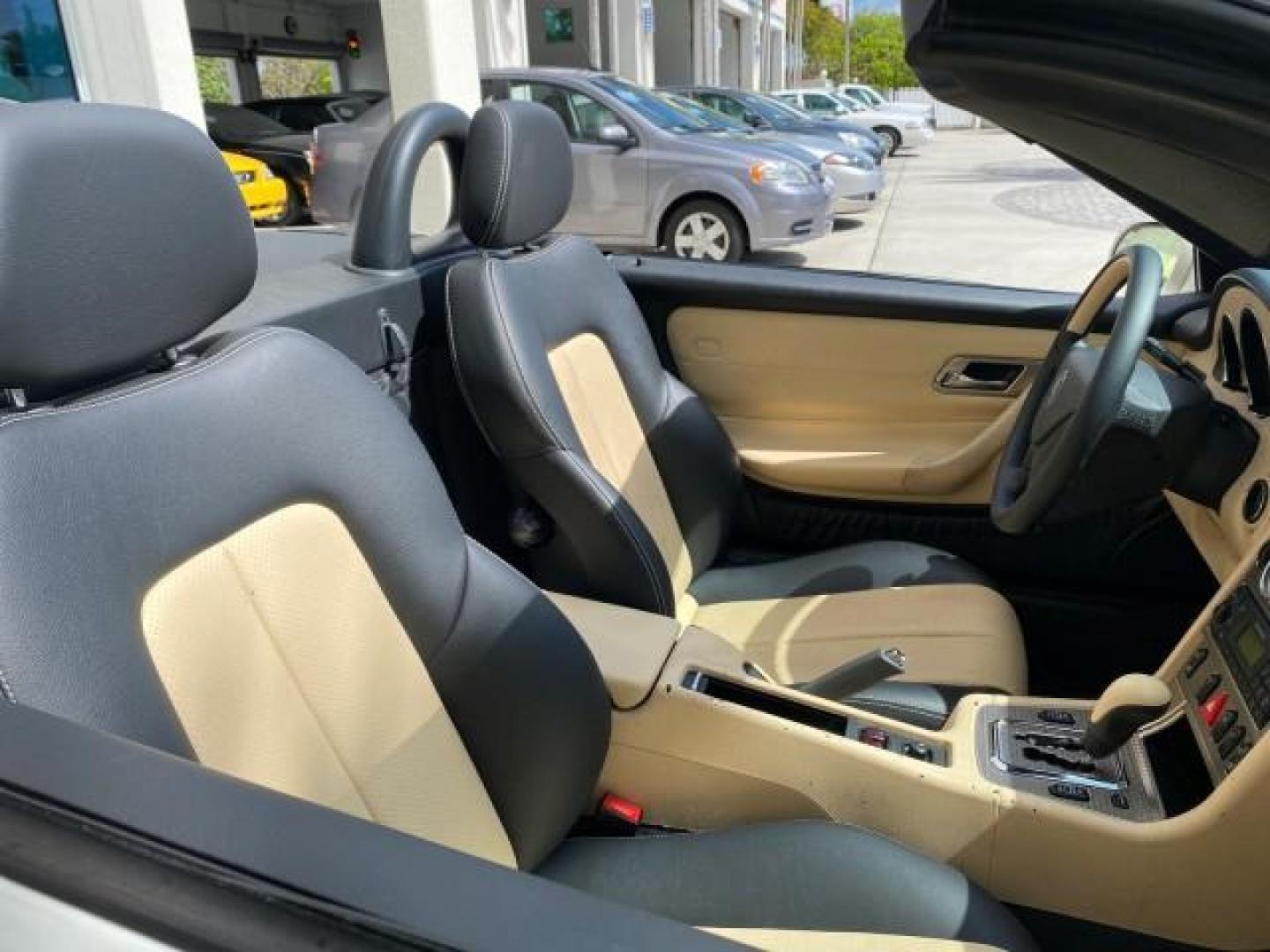 2002 Alabaster White /Charcoal/Beige Mercedes-Benz SLK-Class 2.3L SLK CONV LOW MILES 48,941 (WDBKK49F32F) with an 2.3L Supercharged And Intercooled DOHC SMPI 16-Valve In-Line 4-Cyl Engine engine, Automatic transmission, located at 4701 North Dixie Hwy, Pompano Beach, FL, 33064, (954) 422-2889, 26.240938, -80.123474 - OUR WEBPAGE FLORIDACARS1.COM HAS OVER 100 PHOTOS AND FREE CARFAX LINK 2002 Mercedes-Benz SLK 230 Kompressor Convertible 2.3L I4 F DOHC 16V Gasoline 30 MPG Rear Wheel Drive Features ABS Brakes Air Conditioning Alloy Wheels AM/FM Stereo Automatic Transmission BOSE Sound System Cassette Player Cruise C- Photo#52
