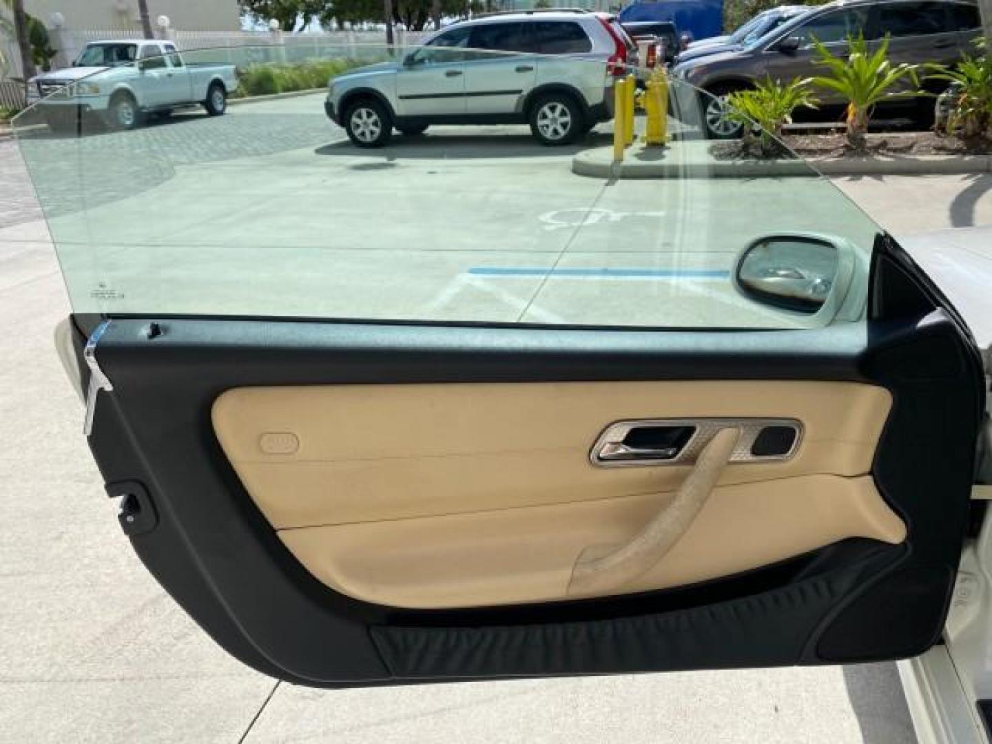 2002 Alabaster White /Charcoal/Beige Mercedes-Benz SLK-Class 2.3L SLK CONV LOW MILES 48,941 (WDBKK49F32F) with an 2.3L Supercharged And Intercooled DOHC SMPI 16-Valve In-Line 4-Cyl Engine engine, Automatic transmission, located at 4701 North Dixie Hwy, Pompano Beach, FL, 33064, (954) 422-2889, 26.240938, -80.123474 - OUR WEBPAGE FLORIDACARS1.COM HAS OVER 100 PHOTOS AND FREE CARFAX LINK 2002 Mercedes-Benz SLK 230 Kompressor Convertible 2.3L I4 F DOHC 16V Gasoline 30 MPG Rear Wheel Drive Features ABS Brakes Air Conditioning Alloy Wheels AM/FM Stereo Automatic Transmission BOSE Sound System Cassette Player Cruise C- Photo#59