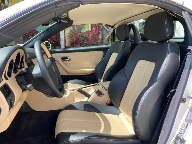 2002 Alabaster White /Charcoal/Beige Mercedes-Benz SLK-Class 2.3L SLK CONV LOW MILES 48,941 (WDBKK49F32F) with an 2.3L Supercharged And Intercooled DOHC SMPI 16-Valve In-Line 4-Cyl Engine engine, Automatic transmission, located at 4701 North Dixie Hwy, Pompano Beach, FL, 33064, (954) 422-2889, 26.240938, -80.123474 - OUR WEBPAGE FLORIDACARS1.COM HAS OVER 100 PHOTOS AND FREE CARFAX LINK 2002 Mercedes-Benz SLK 230 Kompressor Convertible 2.3L I4 F DOHC 16V Gasoline 30 MPG Rear Wheel Drive Features ABS Brakes Air Conditioning Alloy Wheels AM/FM Stereo Automatic Transmission BOSE Sound System Cassette Player Cruise C - Photo#63