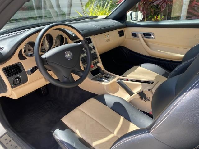 2002 Alabaster White /Charcoal/Beige Mercedes-Benz SLK-Class 2.3L SLK CONV LOW MILES 48,941 (WDBKK49F32F) with an 2.3L Supercharged And Intercooled DOHC SMPI 16-Valve In-Line 4-Cyl Engine engine, Automatic transmission, located at 4701 North Dixie Hwy, Pompano Beach, FL, 33064, (954) 422-2889, 26.240938, -80.123474 - OUR WEBPAGE FLORIDACARS1.COM HAS OVER 100 PHOTOS AND FREE CARFAX LINK 2002 Mercedes-Benz SLK 230 Kompressor Convertible 2.3L I4 F DOHC 16V Gasoline 30 MPG Rear Wheel Drive Features ABS Brakes Air Conditioning Alloy Wheels AM/FM Stereo Automatic Transmission BOSE Sound System Cassette Player Cruise C - Photo#66