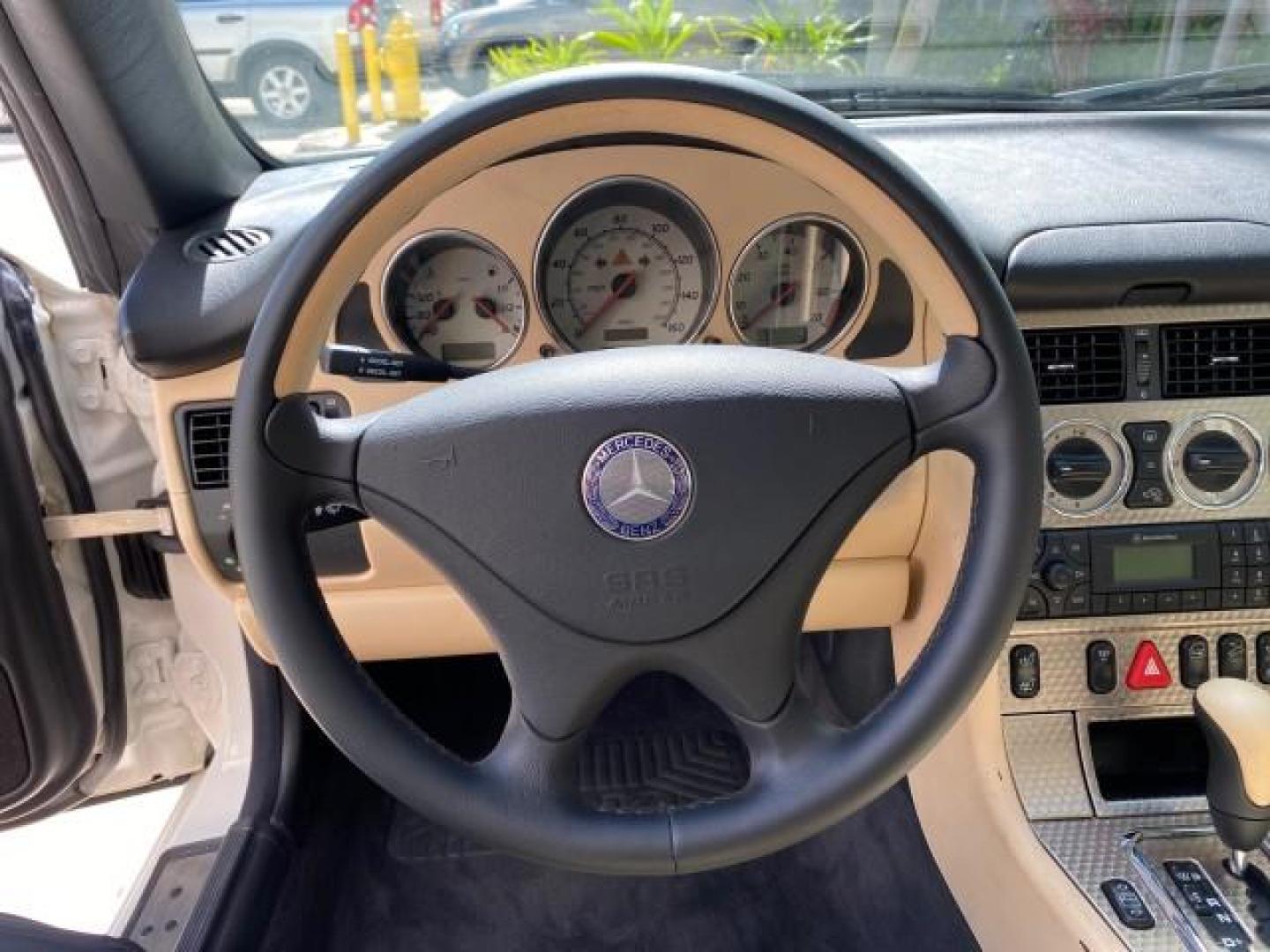 2002 Alabaster White /Charcoal/Beige Mercedes-Benz SLK-Class 2.3L SLK CONV LOW MILES 48,941 (WDBKK49F32F) with an 2.3L Supercharged And Intercooled DOHC SMPI 16-Valve In-Line 4-Cyl Engine engine, Automatic transmission, located at 4701 North Dixie Hwy, Pompano Beach, FL, 33064, (954) 422-2889, 26.240938, -80.123474 - OUR WEBPAGE FLORIDACARS1.COM HAS OVER 100 PHOTOS AND FREE CARFAX LINK 2002 Mercedes-Benz SLK 230 Kompressor Convertible 2.3L I4 F DOHC 16V Gasoline 30 MPG Rear Wheel Drive Features ABS Brakes Air Conditioning Alloy Wheels AM/FM Stereo Automatic Transmission BOSE Sound System Cassette Player Cruise C- Photo#63