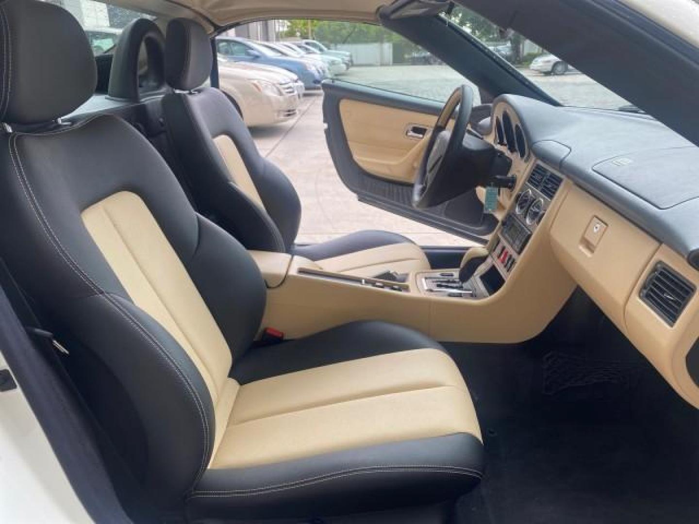 2002 Alabaster White /Charcoal/Beige Mercedes-Benz SLK-Class 2.3L SLK CONV LOW MILES 48,941 (WDBKK49F32F) with an 2.3L Supercharged And Intercooled DOHC SMPI 16-Valve In-Line 4-Cyl Engine engine, Automatic transmission, located at 4701 North Dixie Hwy, Pompano Beach, FL, 33064, (954) 422-2889, 26.240938, -80.123474 - OUR WEBPAGE FLORIDACARS1.COM HAS OVER 100 PHOTOS AND FREE CARFAX LINK 2002 Mercedes-Benz SLK 230 Kompressor Convertible 2.3L I4 F DOHC 16V Gasoline 30 MPG Rear Wheel Drive Features ABS Brakes Air Conditioning Alloy Wheels AM/FM Stereo Automatic Transmission BOSE Sound System Cassette Player Cruise C- Photo#12